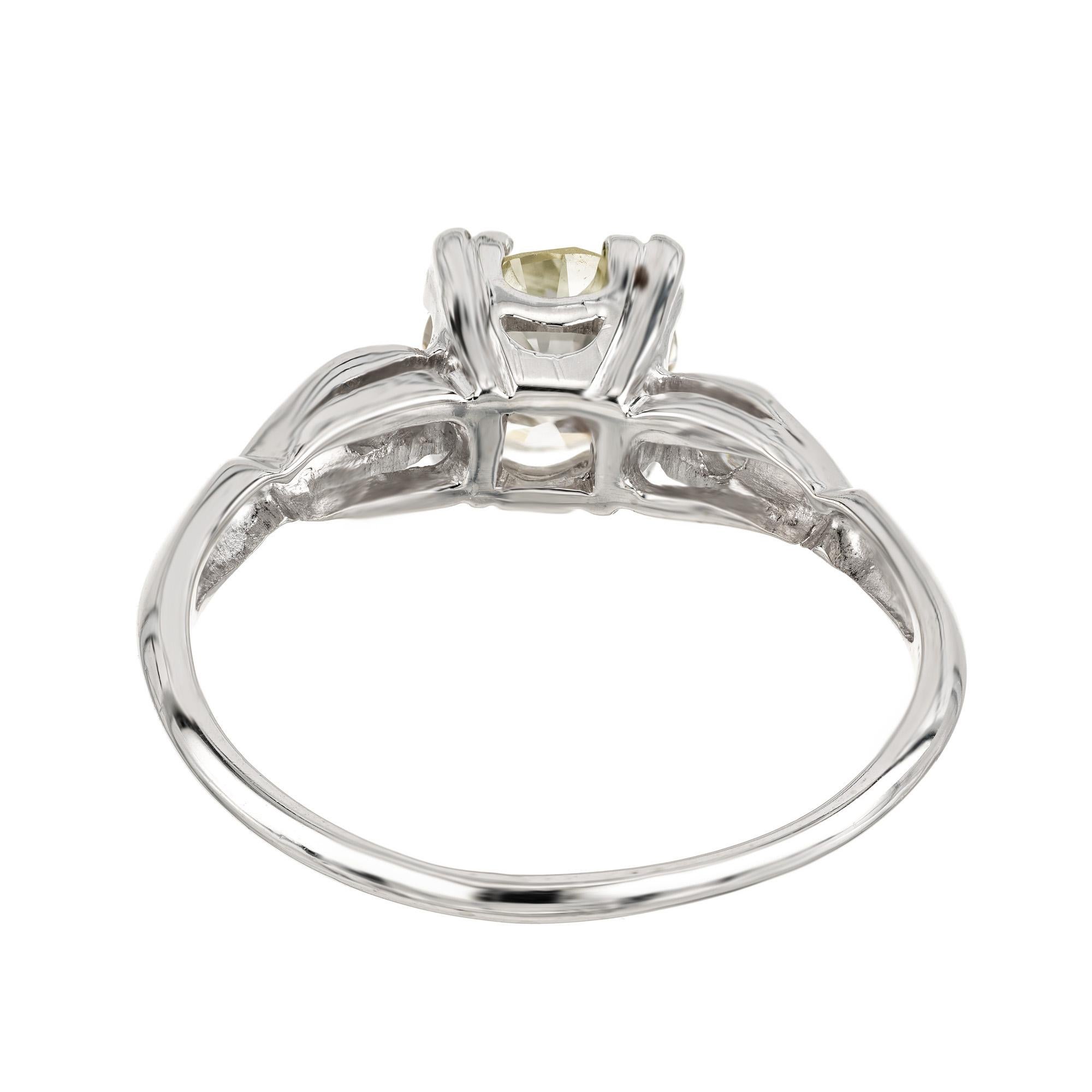 GIA Certified .93 Carat Yellow Diamond Three Stone Platinum Engagement Ring For Sale 1