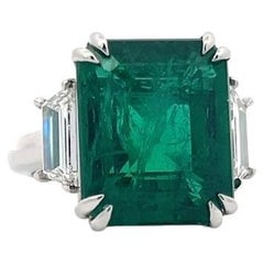 GIA Certified 9.33 Carat Emerald-Cut Emerald Ring with Diamond Side Stones