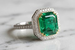 GIA Certified 9.33 Carat Minor Oil Colombian Emerald and Diamond Ring