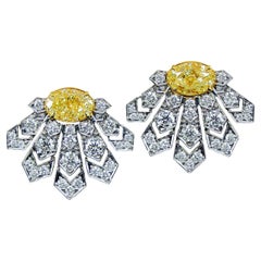 Boucles d
oreilles certifiées GIA en diamant blanc jaune de 9,347 carats 58 diamants