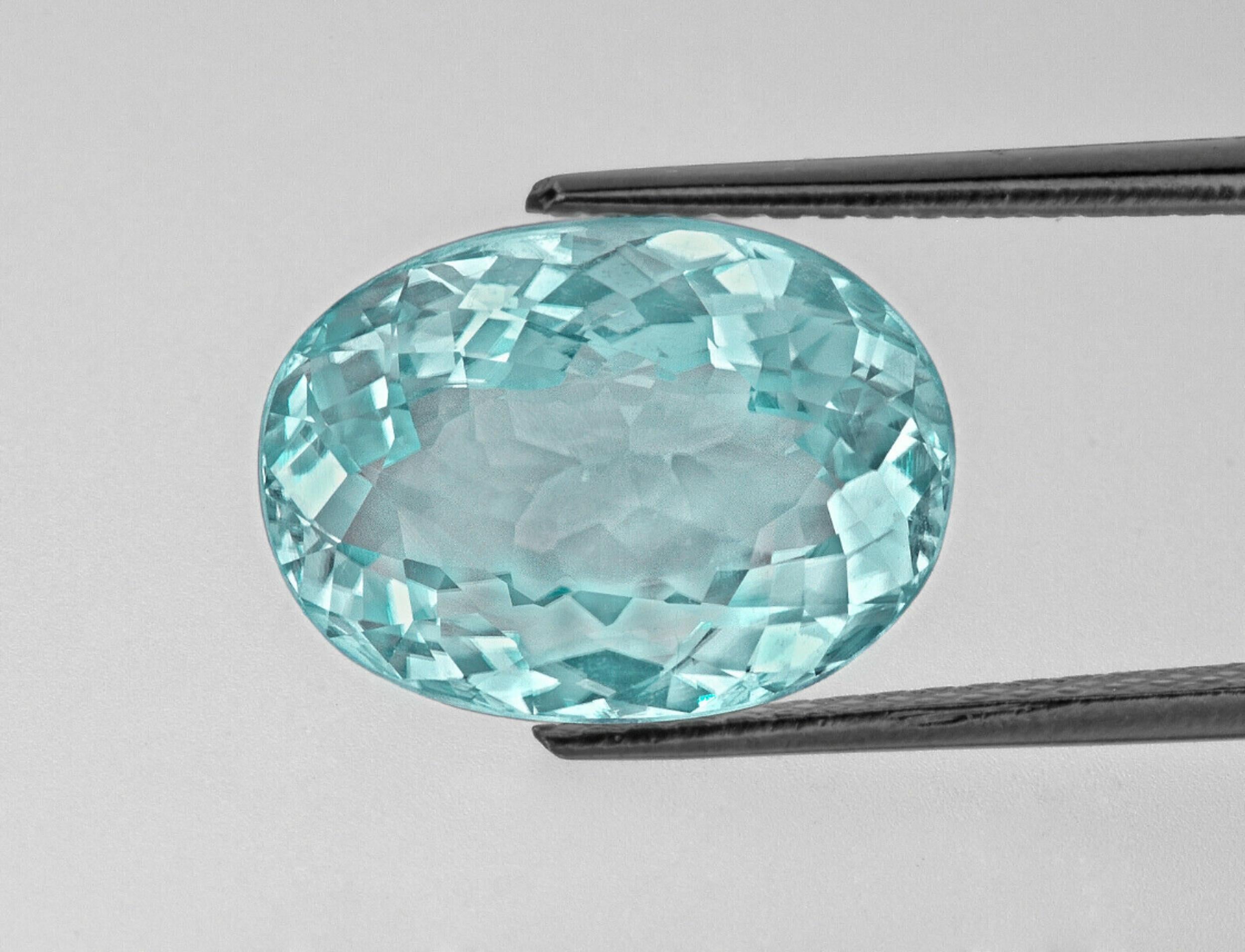 Modern GIA Certified 9.40 Carat No Heat Paraiba Tourmaline Diamond Three-Stone Ring