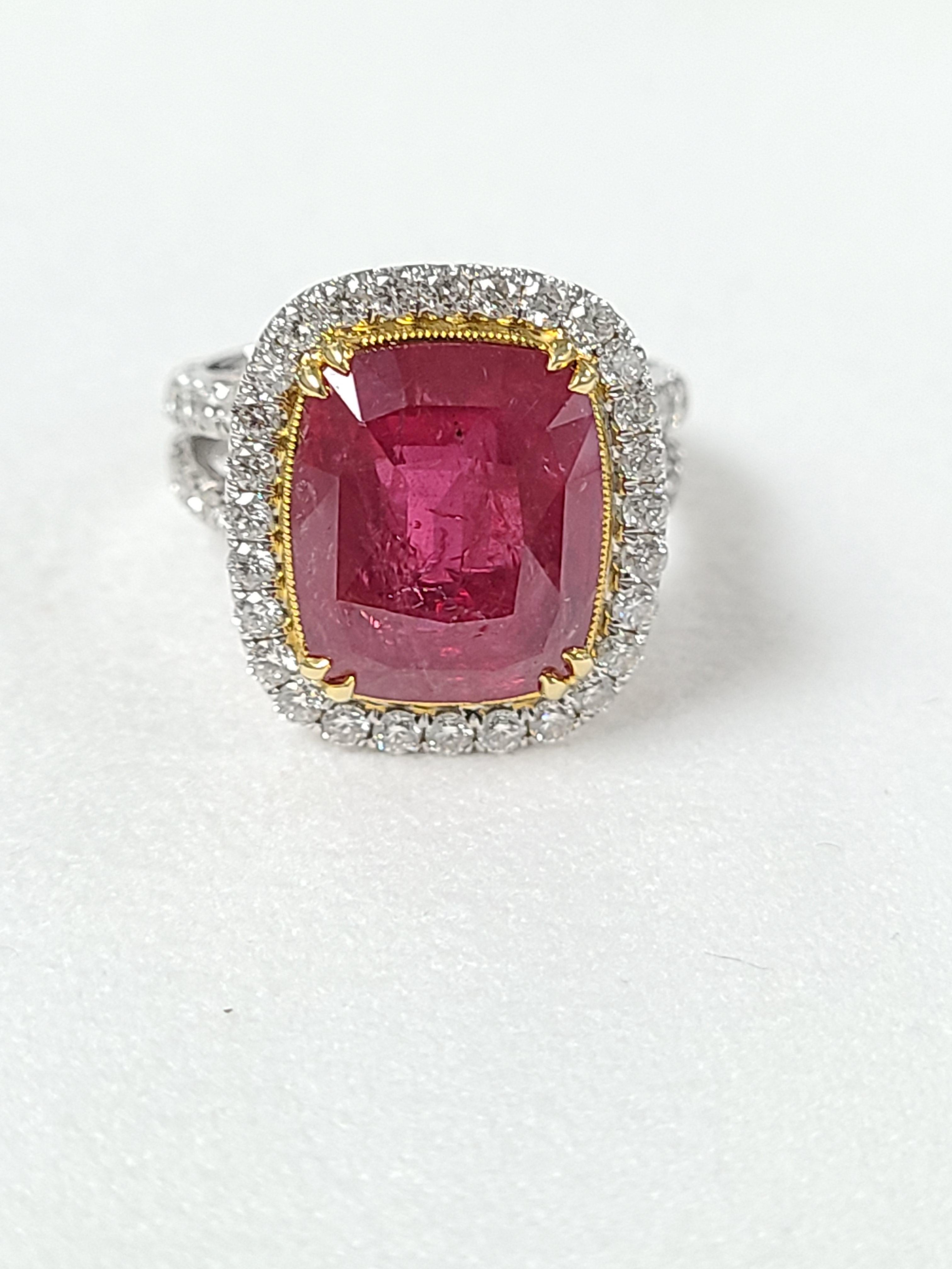 A gorgeous and elegant No Heat Natural ruby ring set in 18k gold . The ruby weight is 9.45 carats and is GIA certified . The ring dimensions in cm 1.5 x 1.2 x 2.6 (L X W X H) . US size 6 1/2.