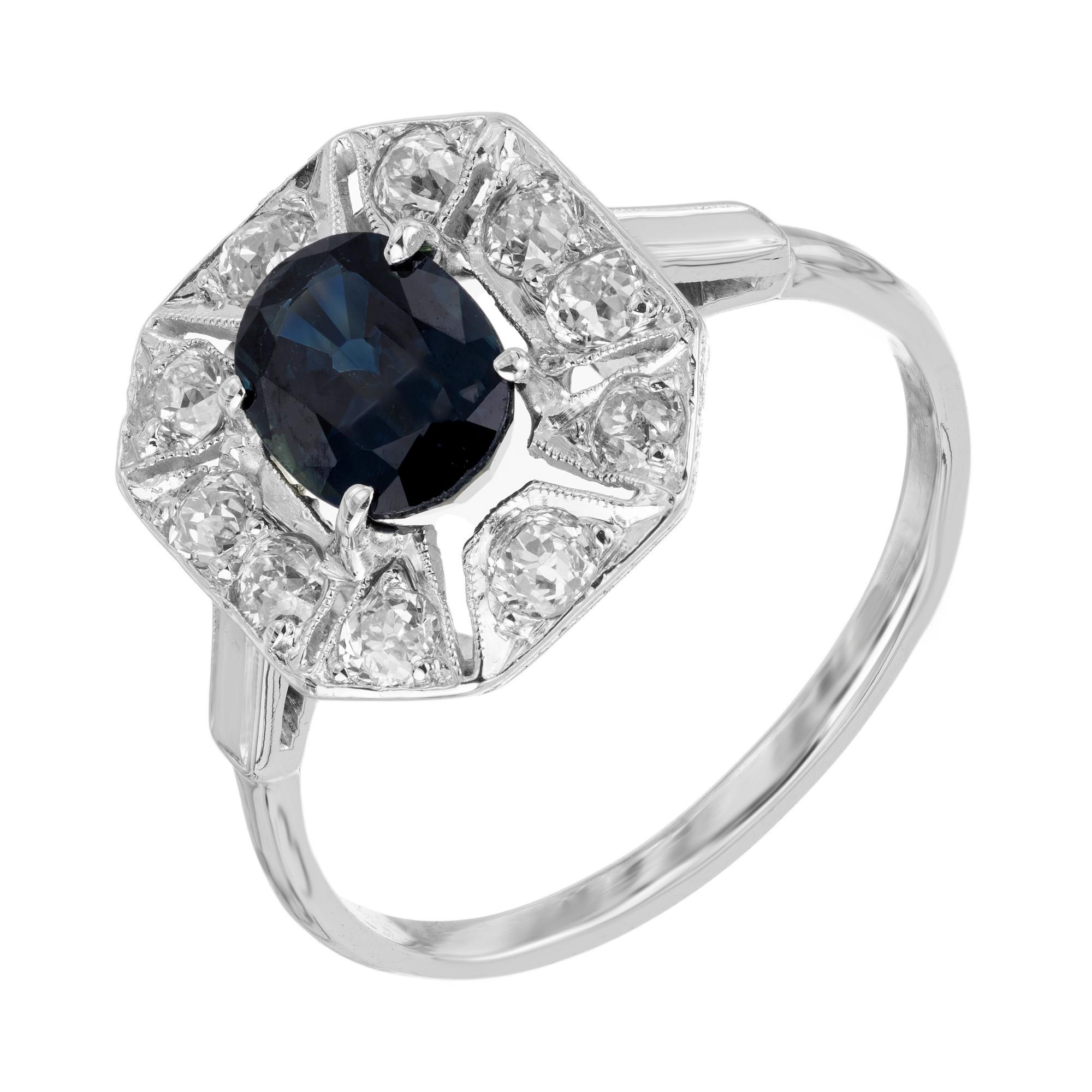 Original 1920's Art Deco sapphire and diamond ring. Crafted to perfection, this deep rich blue .95ct oval sapphire is securely mounted in a handmade platinum setting. Accented with a halo of 10 old mine diamonds. The sapphire is GIA certified