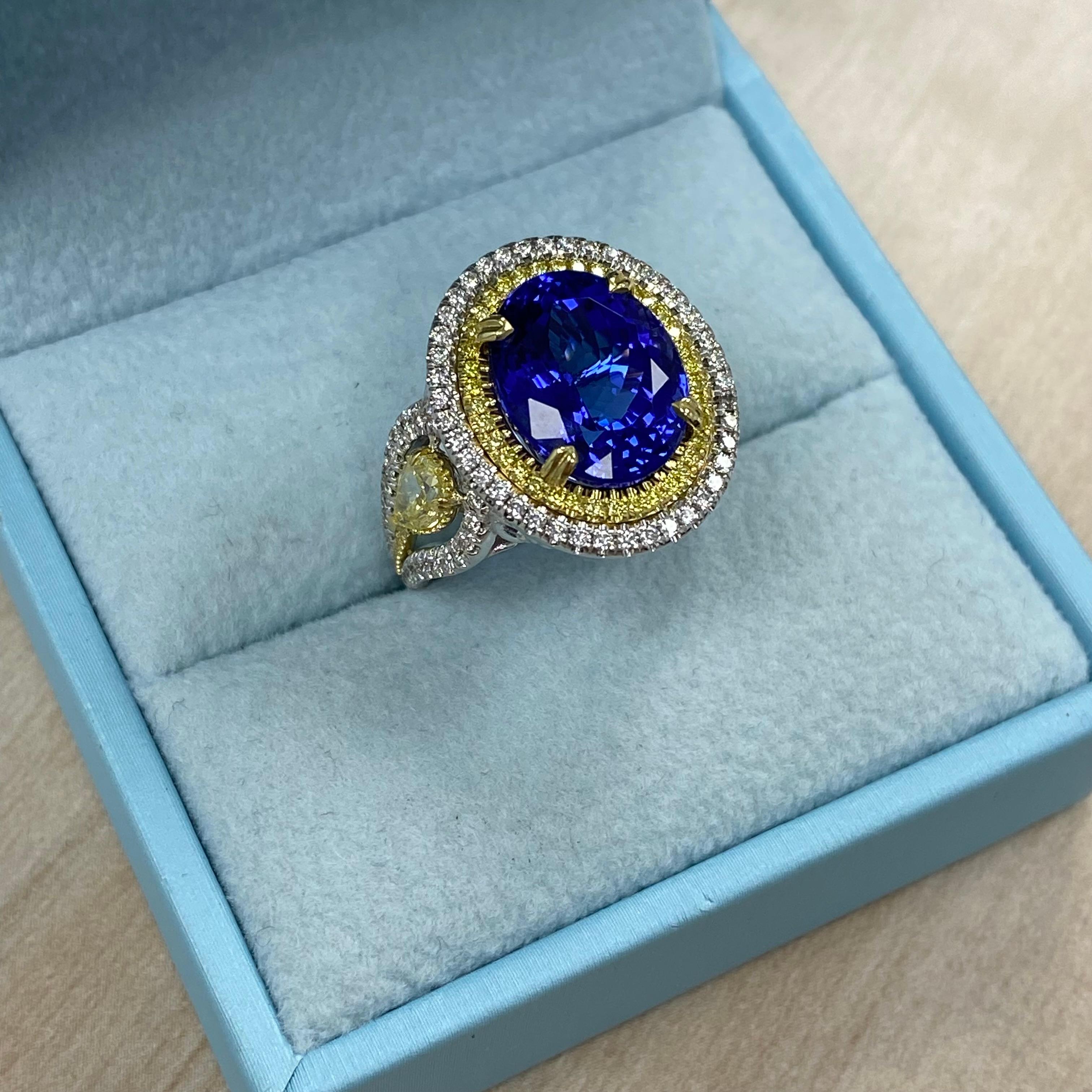 Discover the epitome of elegance with this stunning ring, featuring a magnificent 7.71-carat GIA-certified blue-violet color oval brilliant-cut tanzanite. With GIA report number 6237205142 and impressive measurements of 12.94 x 10.25 x 7.78 mm, the