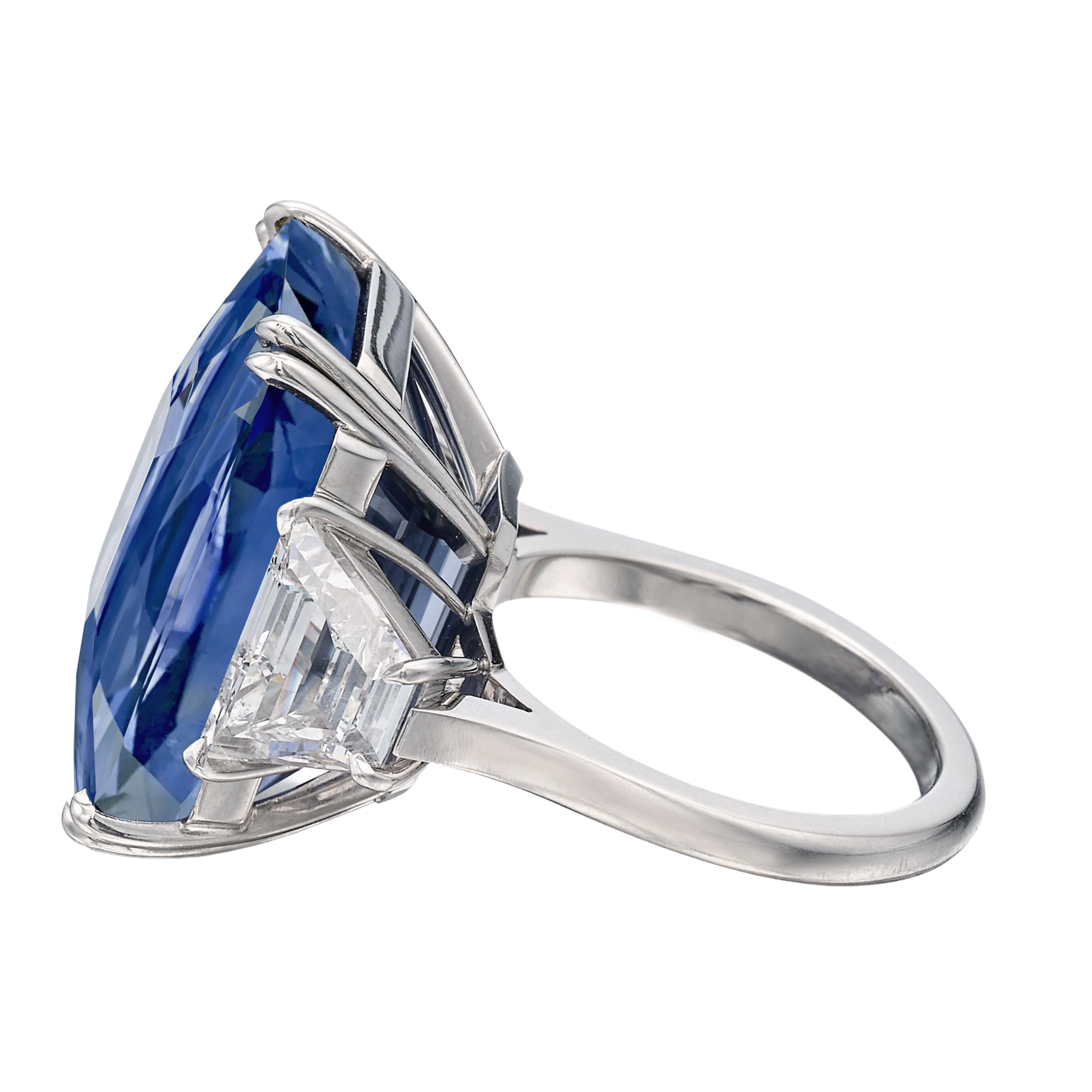 Created by Antinori di Sanpietro this ring is an excellent investment! Showcasing an Emerald Cut Ceylon Sapphire weighing 8 carats, and certified by Gubelin and GIA as an untreated, UNHEATED Sri Lankan Ceylon Sapphire. You will notice very few