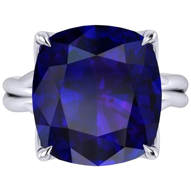 GIA Certified 9.23 carat Tanzanite Cushion Cut in 18 Karat gold cocktail ring For Sale