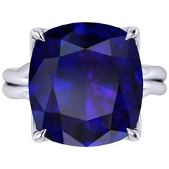 GIA Certified 9.23 carat Tanzanite Cushion Cut in 18 Karat gold cocktail ring