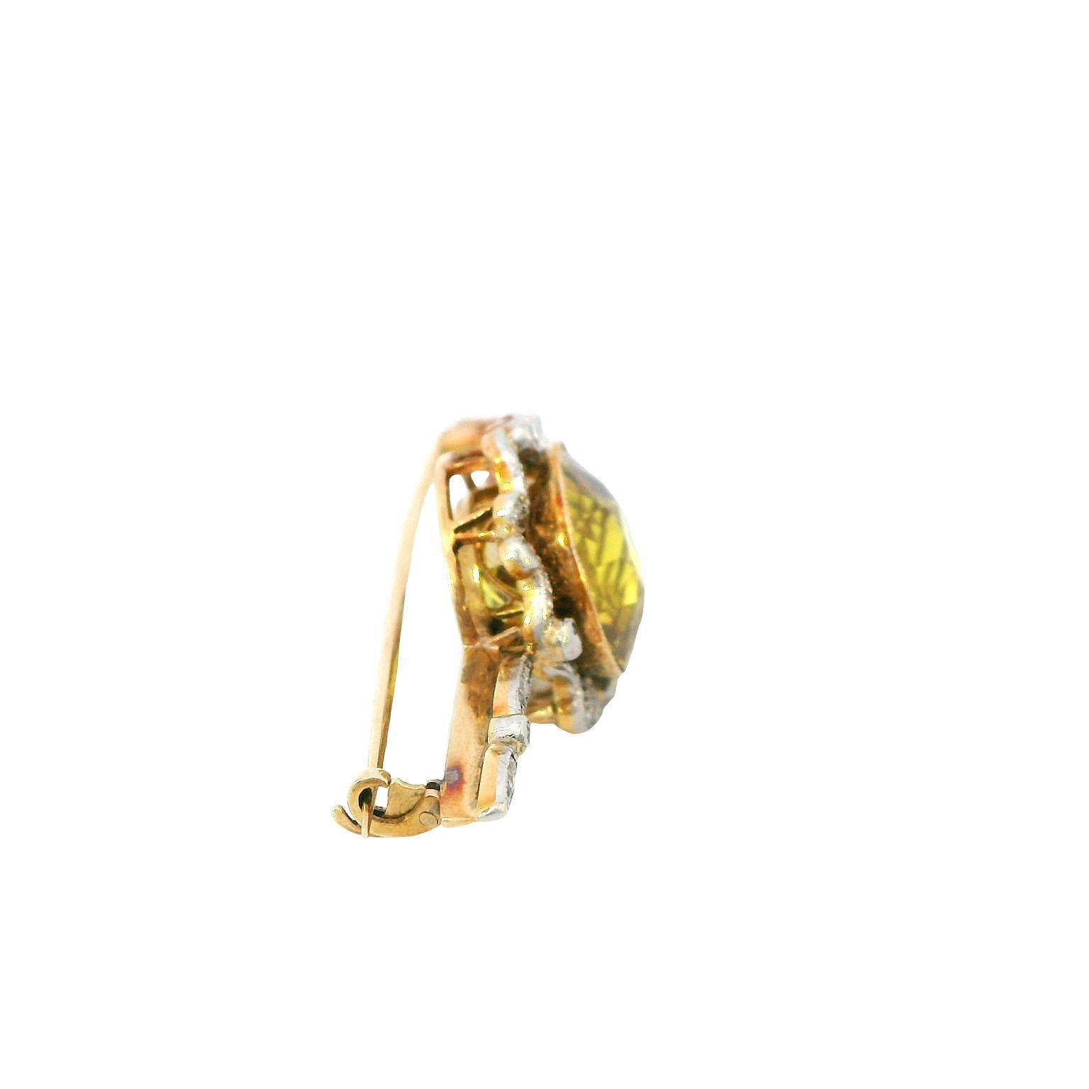 Introducing our exquisite Natural Yellow Sapphire and Diamond Brooch that holds a rich history of over 100 years., a timeless masterpiece steeped in history and elegance. Crafted with meticulous attention to detail, this brooch features a