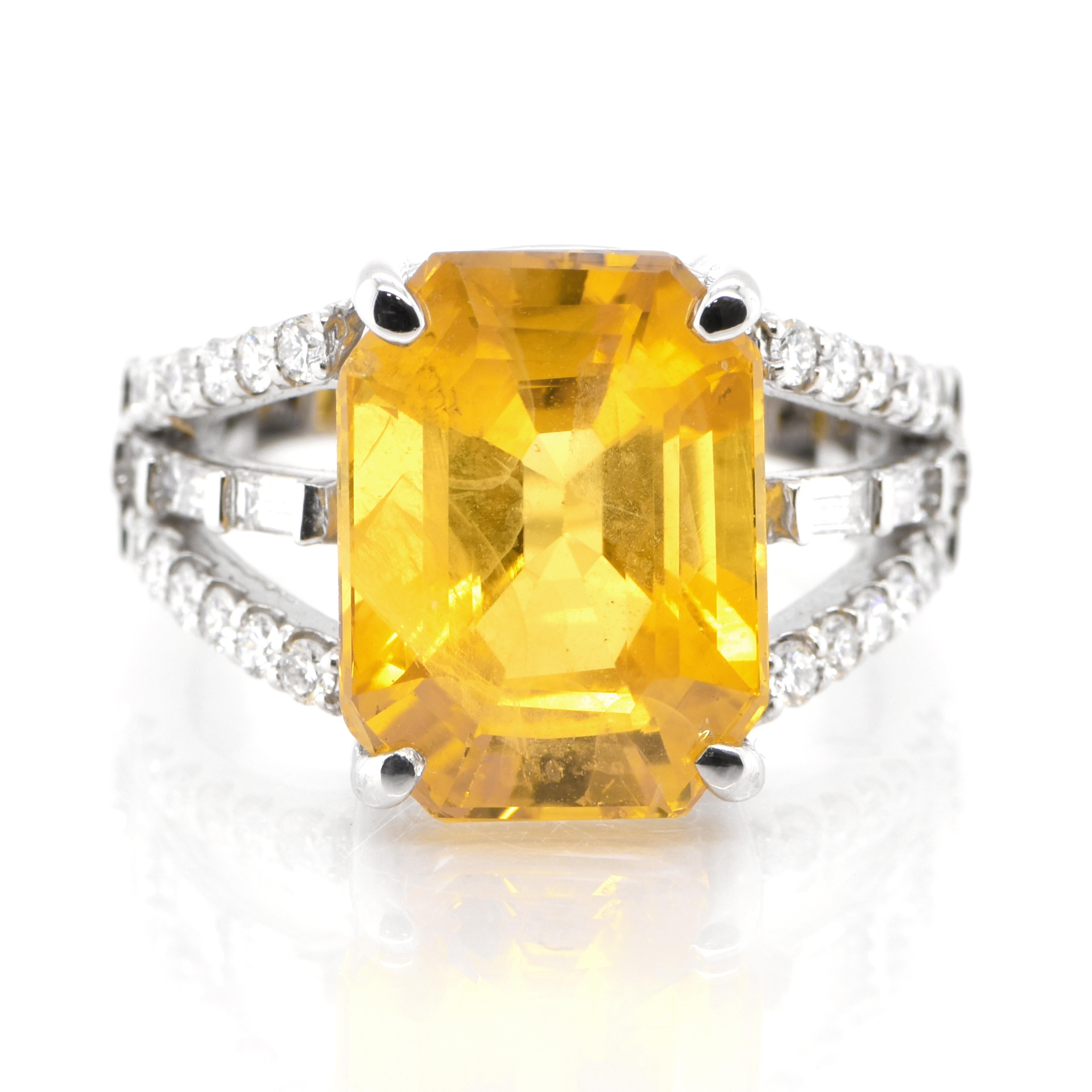 A stunning Cocktail Ring featuring a GIA Certified 9.78 Carat Natural Yellow Sapphire and 0.58 Carats of Diamond Accents set in Platinum. The Yellow Sapphire is heat treated and color is induced by lattice diffusion treatment. Sapphires have