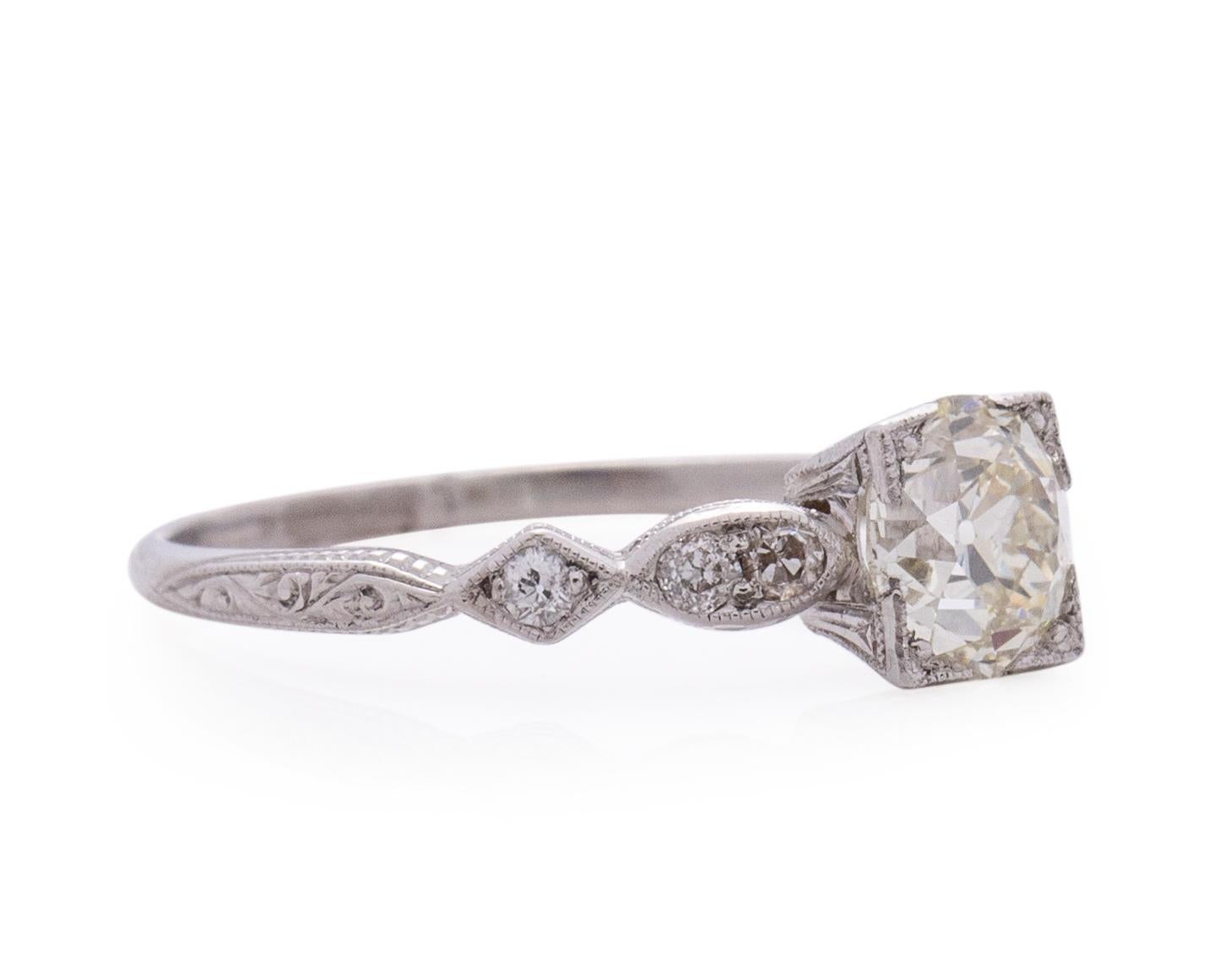 Item Details: 
Ring Size: 7.25
Metal Type: Platinum [Hallmarked, and Tested]
Weight: 3.0 grams

Center Diamond Details:
GIA REPORT #:2215393200
Weight: .98 Carat
Cut: Old European brilliant
Color: N (Light Yellow Tint)
Clarity: VVS2
Measurements: