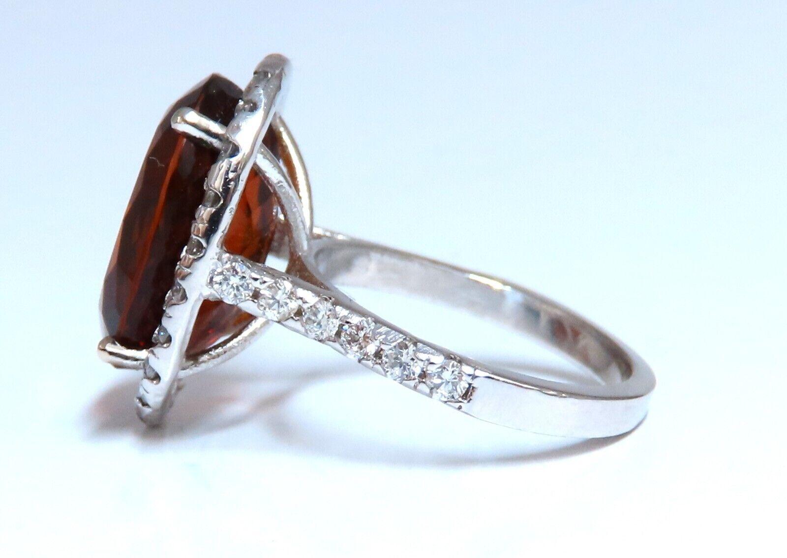 GIA certified 9.89 carat natural citrine diamonds ring.

Oval cut, clean clarity and transparent.

Brownish Orange color.


16.3 x 12.8 mm


1.19ct natural round side diamonds

G-color vs2 clarity

14 karat white gold 6.9 g


Deck of ring 20x16