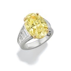 GIA Certified 9.97 Carat Oval Fancy Light Yellow and Baguette Diamond Ring
