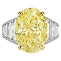 GIA Certified 9.97 Carat Oval Fancy Light Yellow and Baguette Diamond Ring