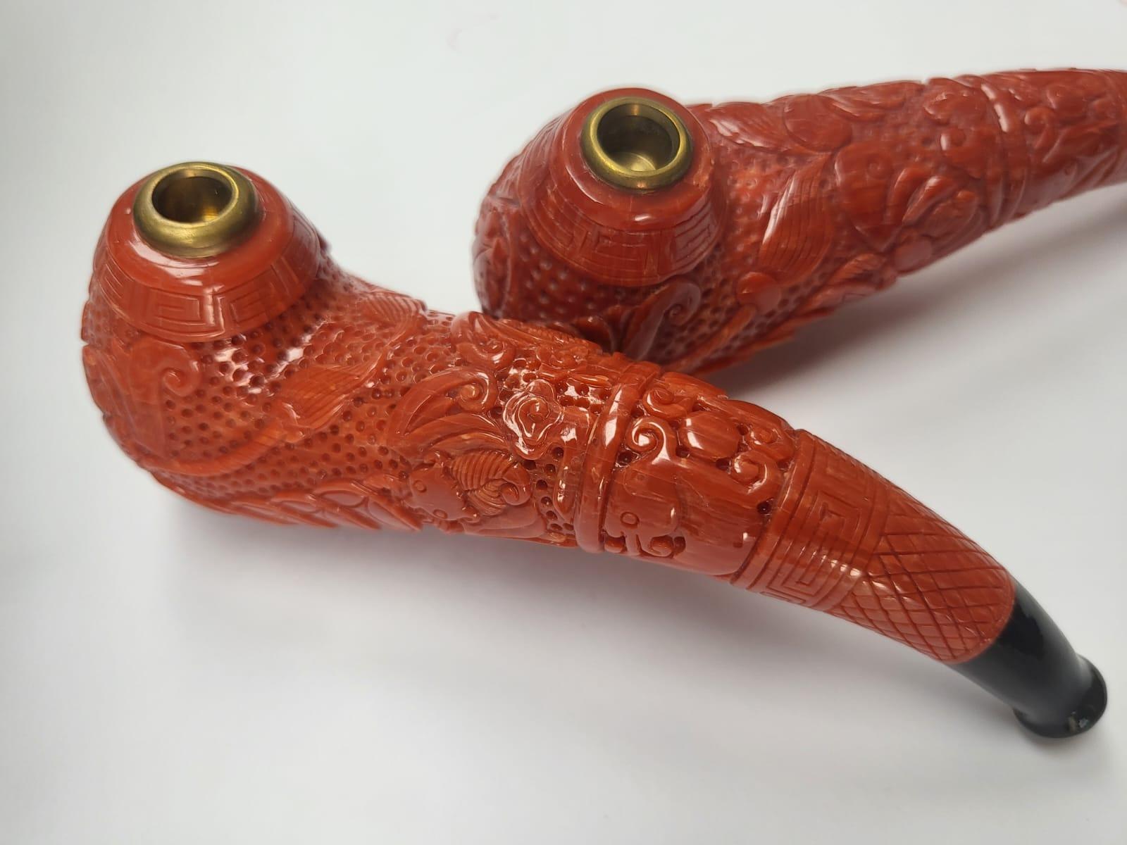 Round Cut GIA Certified, a pair of natural, carved Coral Pipes For Sale