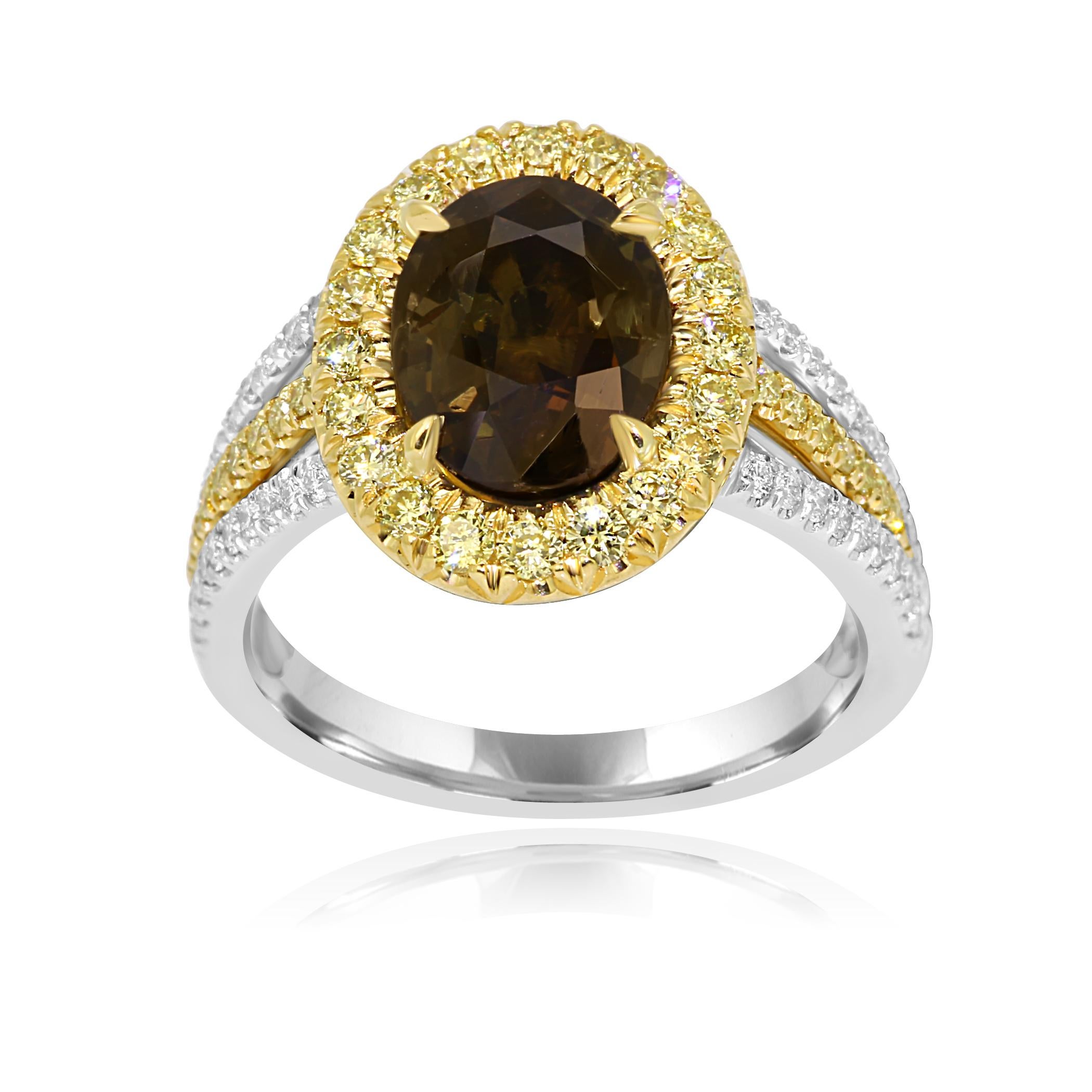 Gorgeous 2.76 Carat Alexandrite Oval Encircled in a Single Halo of Natural Fancy Yellow Diamond Round 0.48 Carat with White Diamond Rounds 0.25 Carat in a Stunning Three Prong Shank 18K White and Yellow Gold Ring.

Style available in different price