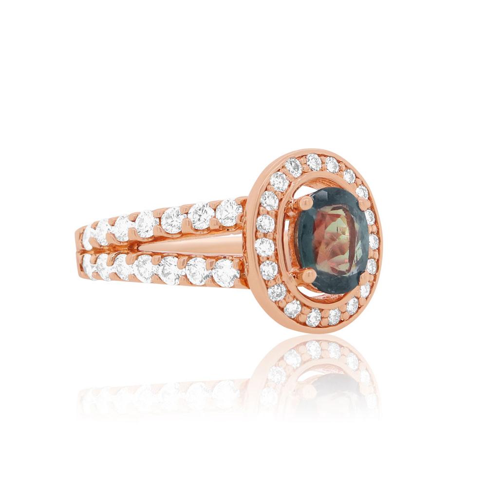 Material: 14K Rose Gold
Center Stone Details: 1 Oval Alexandrite at 1.06 Carats - GIA Certificate Attached
Color Change: Greenish Blue Changing To Purple
Side Stone Details: 47 Brilliant Round White Diamonds at 0.98 Carats Total Weight

Fine