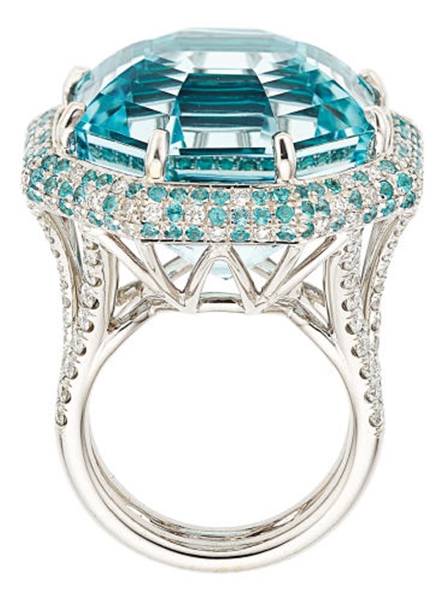 A rich blue octagonal aquamarine, 35.50 carats.  Set in an exceptional 18 white gold setting, with 1.43 carats of diamonds and 1.40 carats of paraiba tourmalines.  A rare and special piece for anyone to own.

GIA Report # 5171289024