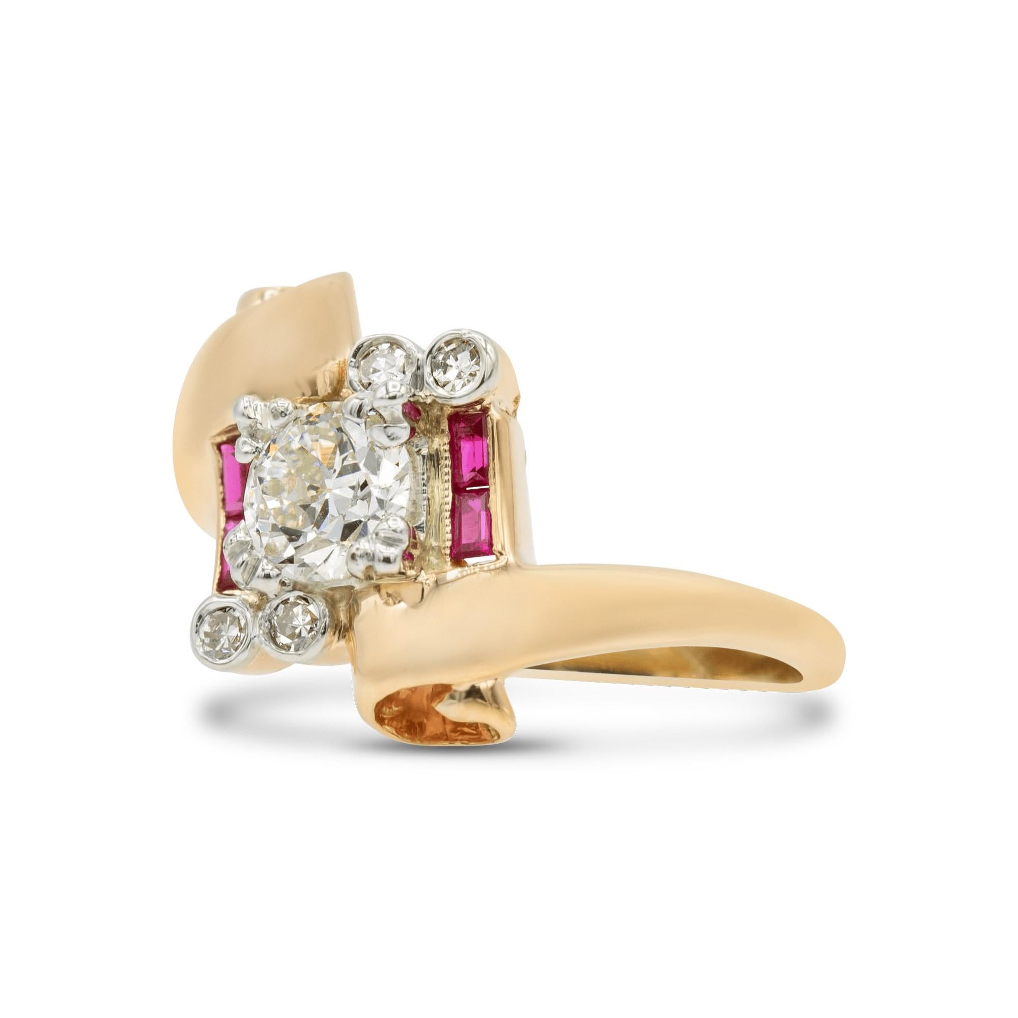 This shining rose gold setting is the home to a 0.53 ct. old Euro with a small table and chunky facet patterns, it has the true qualities of an antique stone. Its accenting rubies and single-cut diamonds add so much charm and the scroll detail on