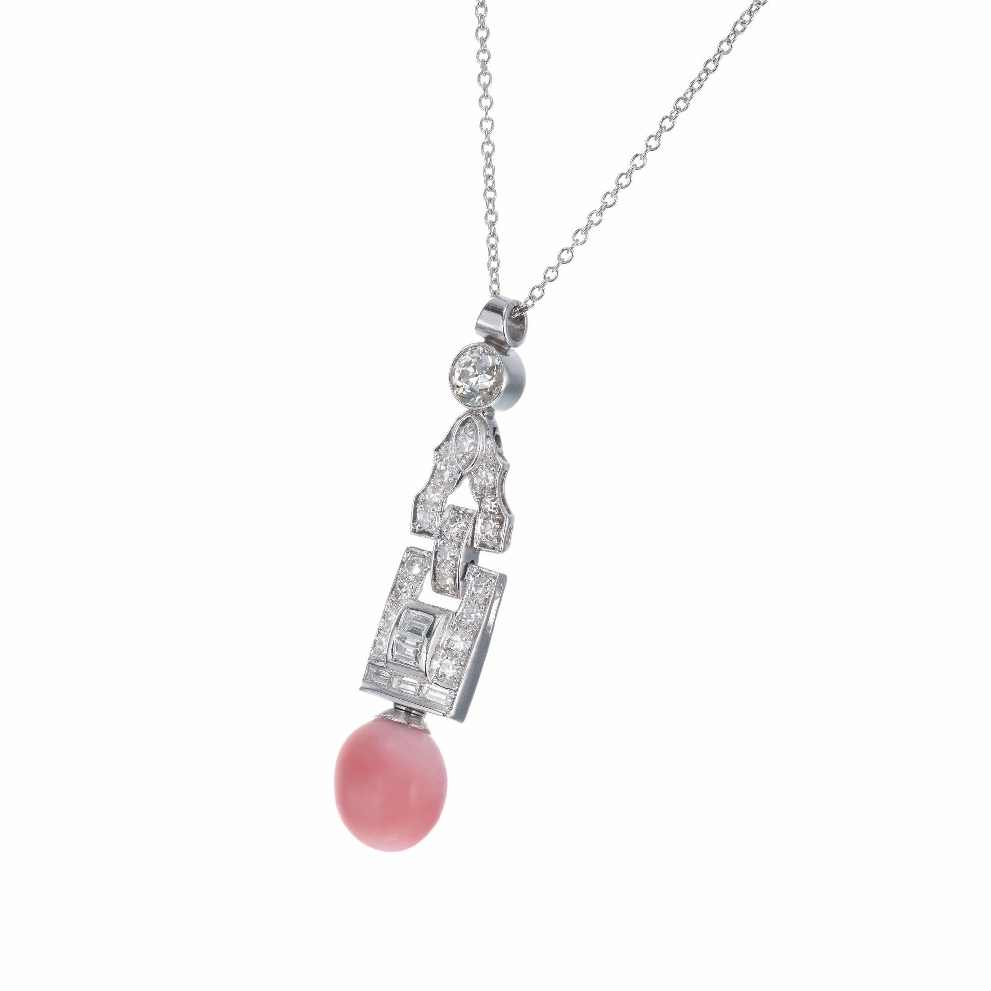 Original Art Deco 1920’s pendant set with a natural conch pink pearl and European and baguette cut accent diamonds, with a 16 inch platinum chain. GIA Certified 

1 saltwater conch pink pearl, approx. 5.11cts GIA Certificate # 2205201063
1 Old