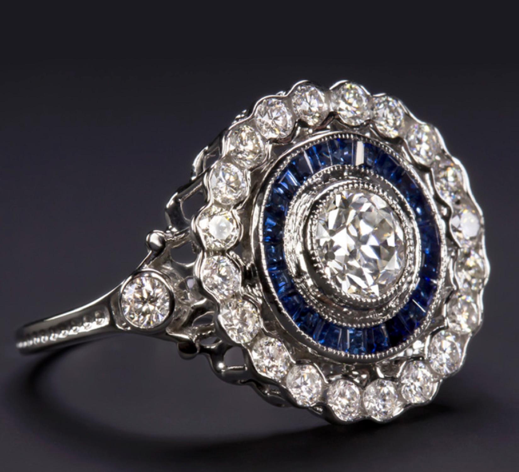 An exquisite ring composed by a GIA certified diamond with a halo of very well saturated blue sapphires and another halo of round brilliant cut diamonds all very pure and bright!

The ring is really well made with an excellent quality 