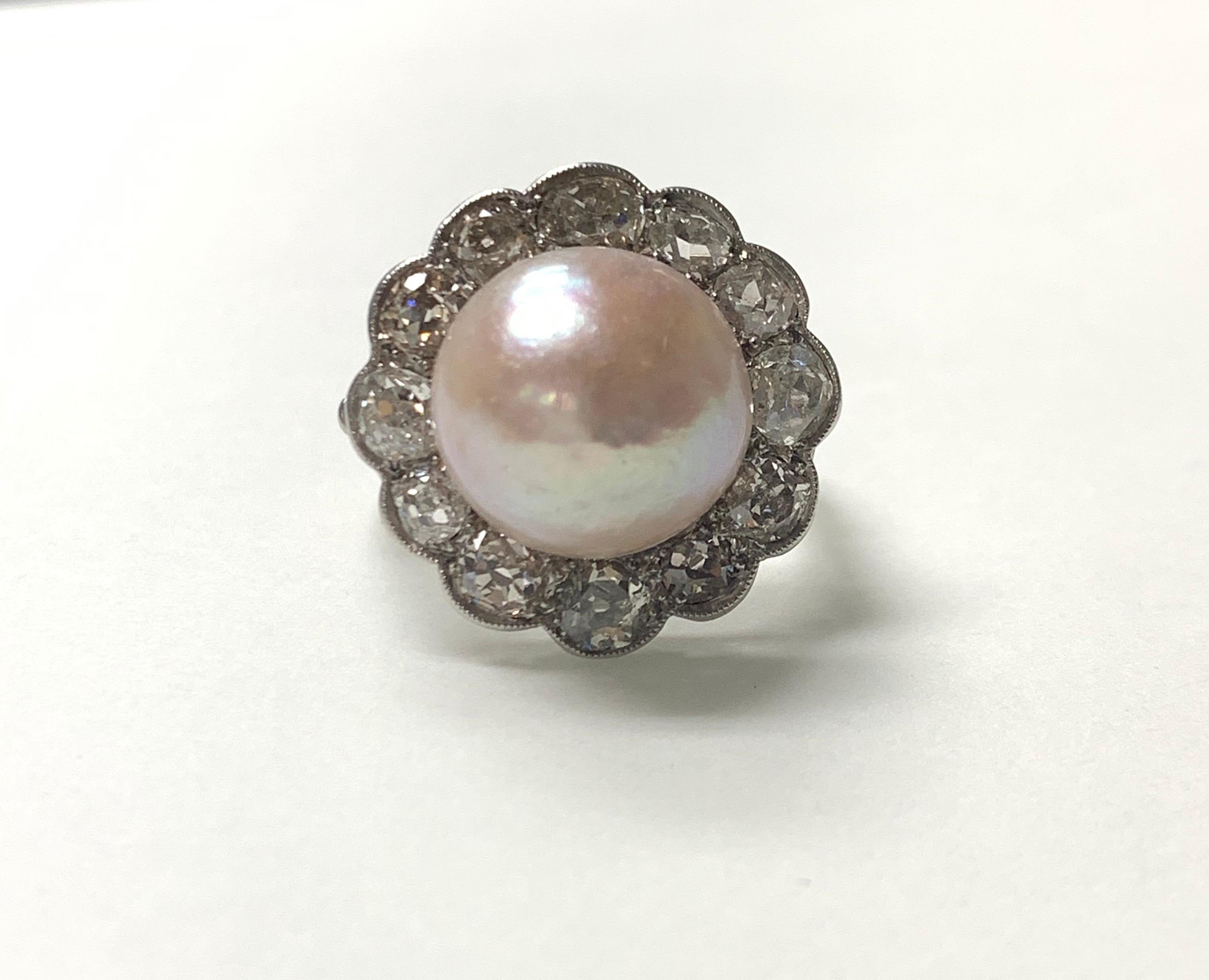 This gorgeous GIA certified art deco light pinkish brown button mabe pearl and diamond ring handcrafted in platinum. 
Pearl :Light Pinkish Brown Mabe button pearl with dimensions 1.4 mm to 2.9mm 
Diamonds : 3 carats approx ( HI color and VS SI
