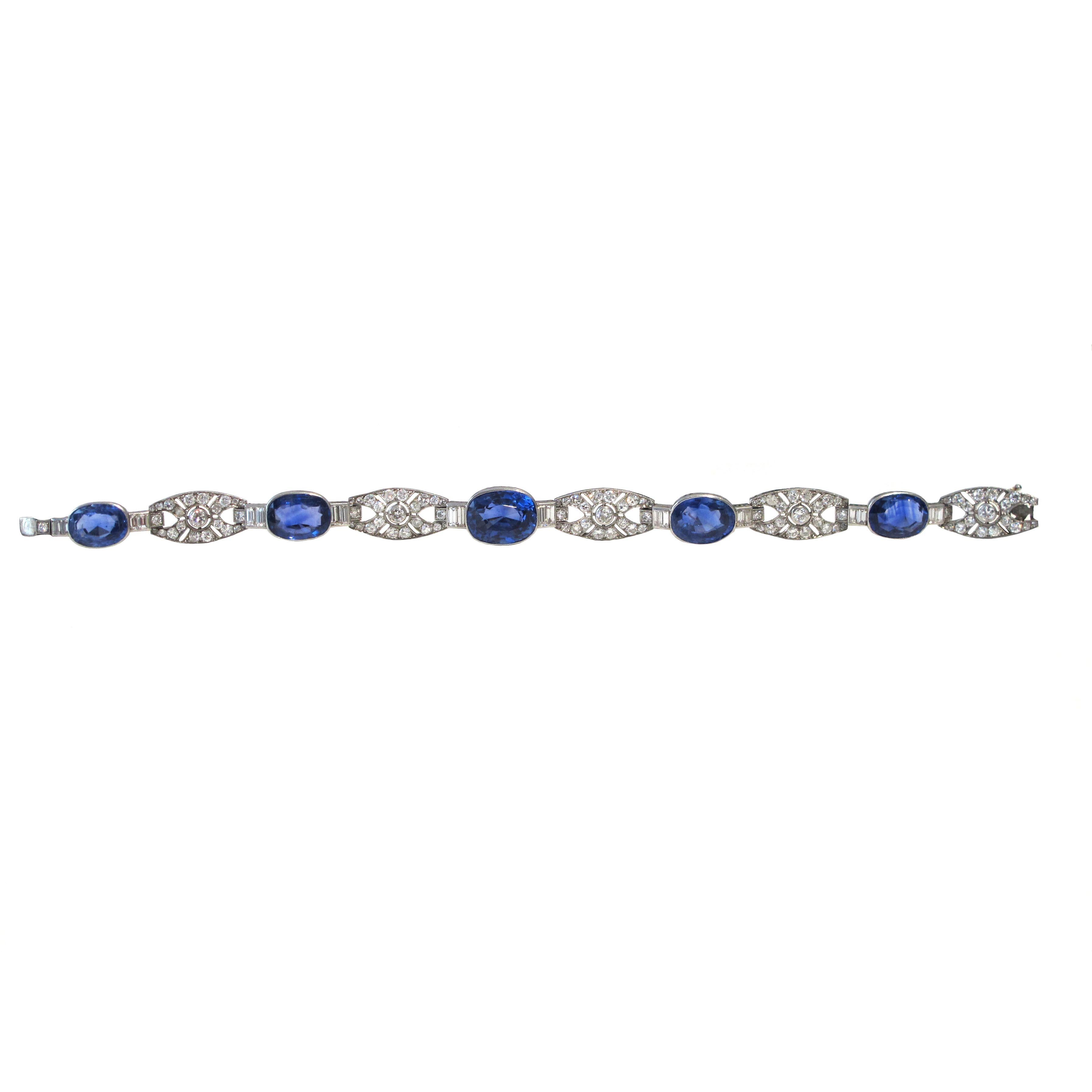 Platinum Art Deco sapphire and diamond link tennis bracelet. This bracelet is one of a kind and in excellent condition. There are 5 blue natural sapphires that have all been certified by the GIA, Gemelogical Institute of America. The certificate