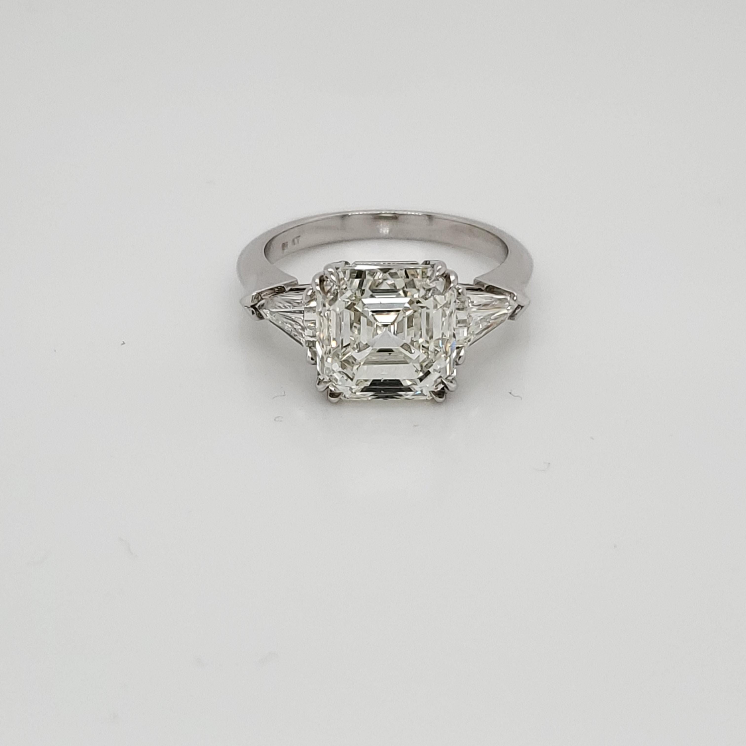 GIA Certified Asscher Cut 4.26 Carat Three-Stone Ring 2