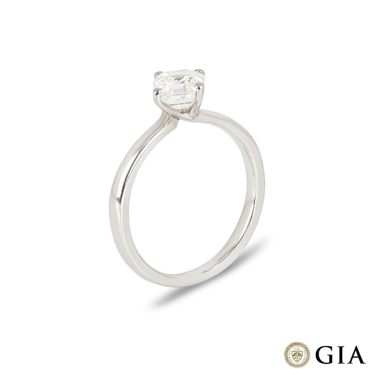 An elegant asscher cut diamond engagement ring in platinum. The central asscher cut diamond weighs 1.00ct, is G colour and VS2 clarity. The diamond is set in a classic four claw mount with a 2mm band. The ring is currently a size L but can be