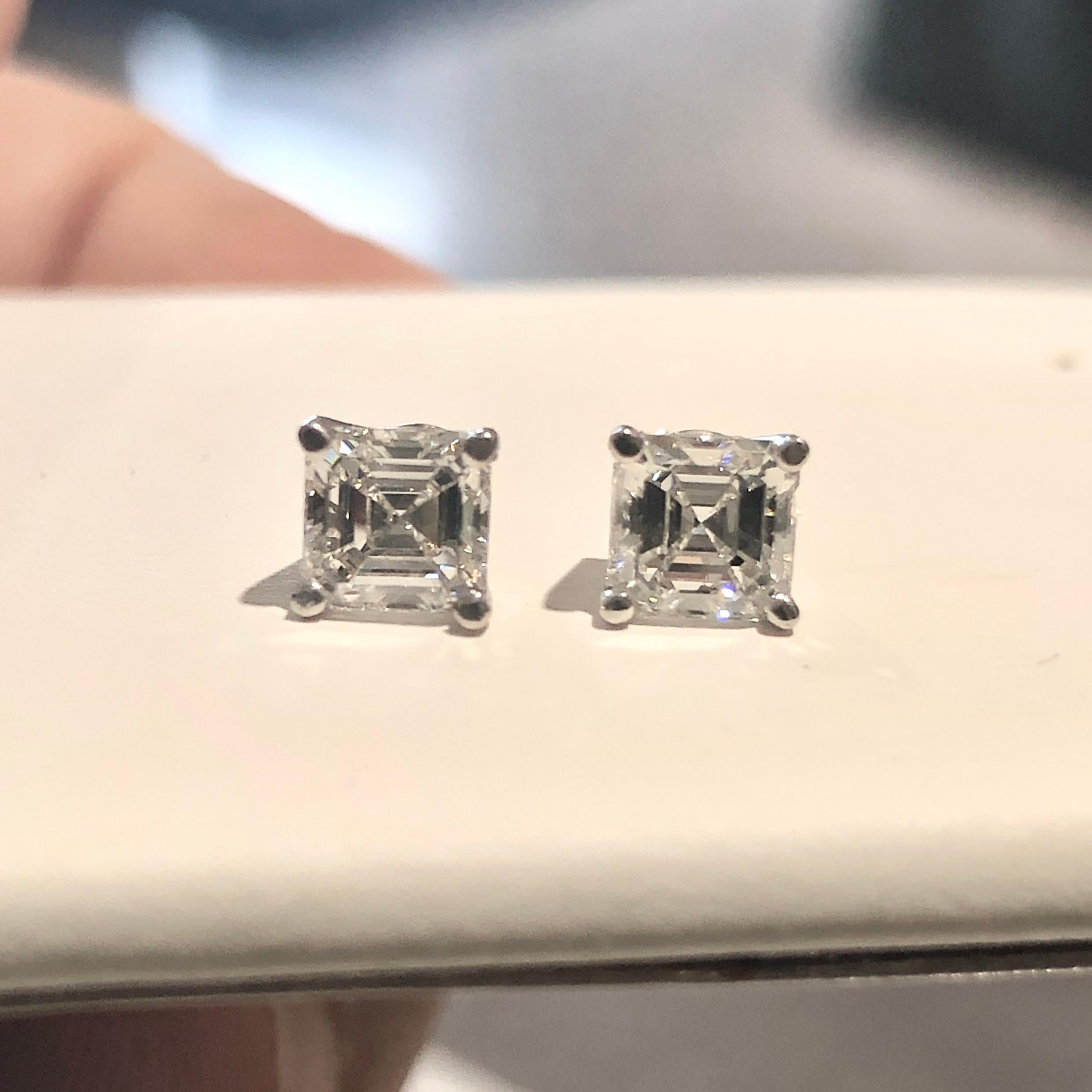 GIA Asscher cut diamond stud earrings 1.07 carat.  Style prong basket setting in 14K Gold. GIA Certified.   
1 asscher cut F- VS1 diamond, Approximate 0.54 carats. GIA Certificate 
1 asscher cut F-VS1 diamond, Approximate 0.53 carats. GIA certificate