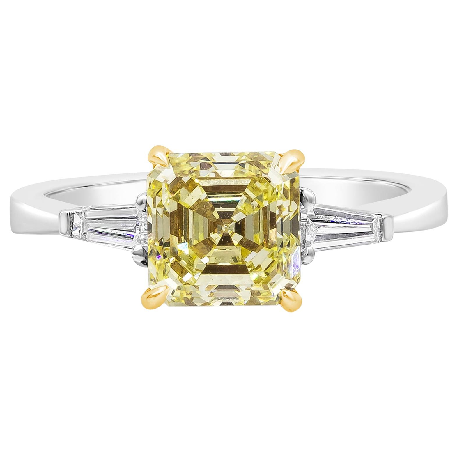 GIA Certified 2.13 Carats Asscher Cut Yellow Diamond Three-Stone Engagement Ring For Sale