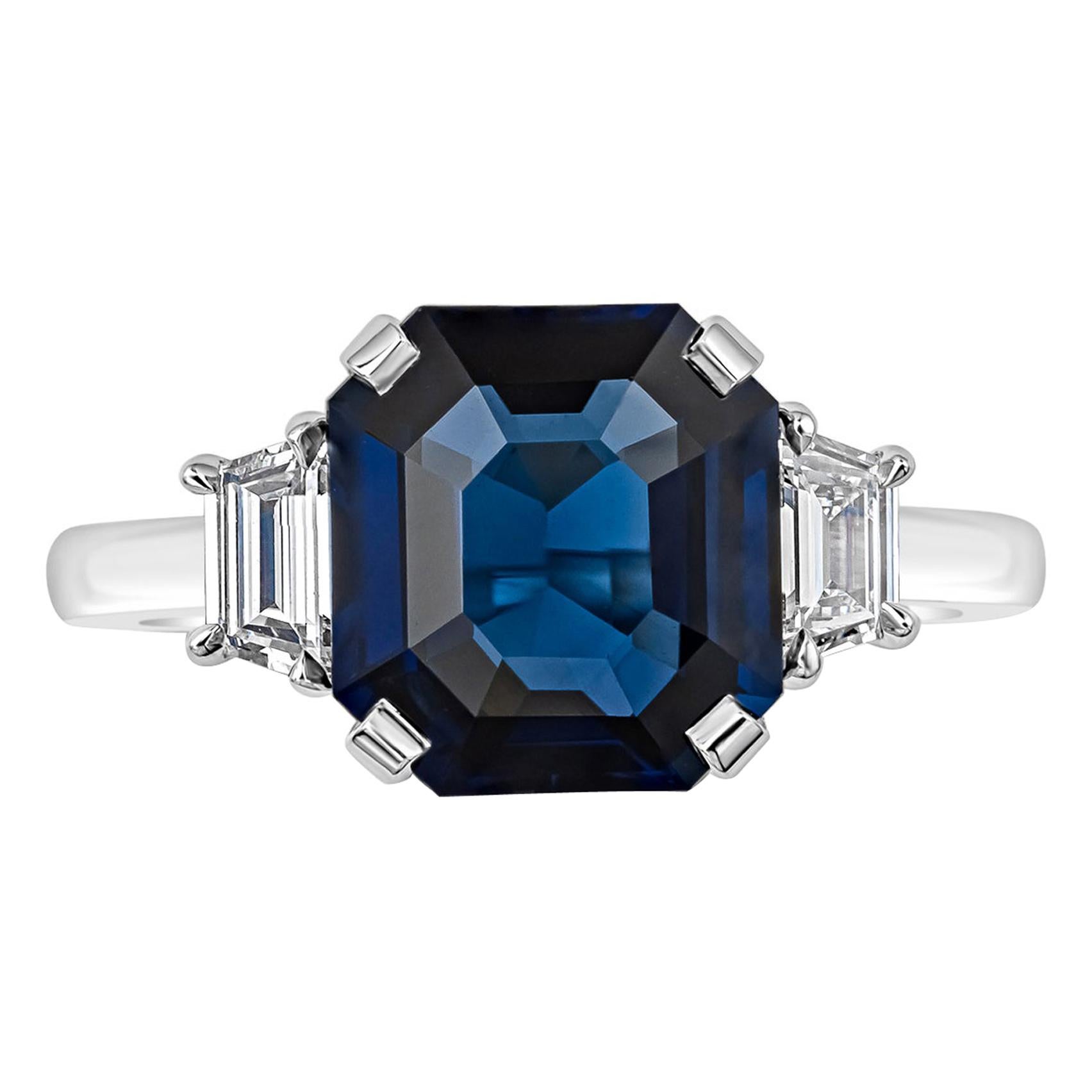 GIA Certified 3.73 Carats Emerald Cut Blue Sapphire Three-Stone Engagement Ring For Sale