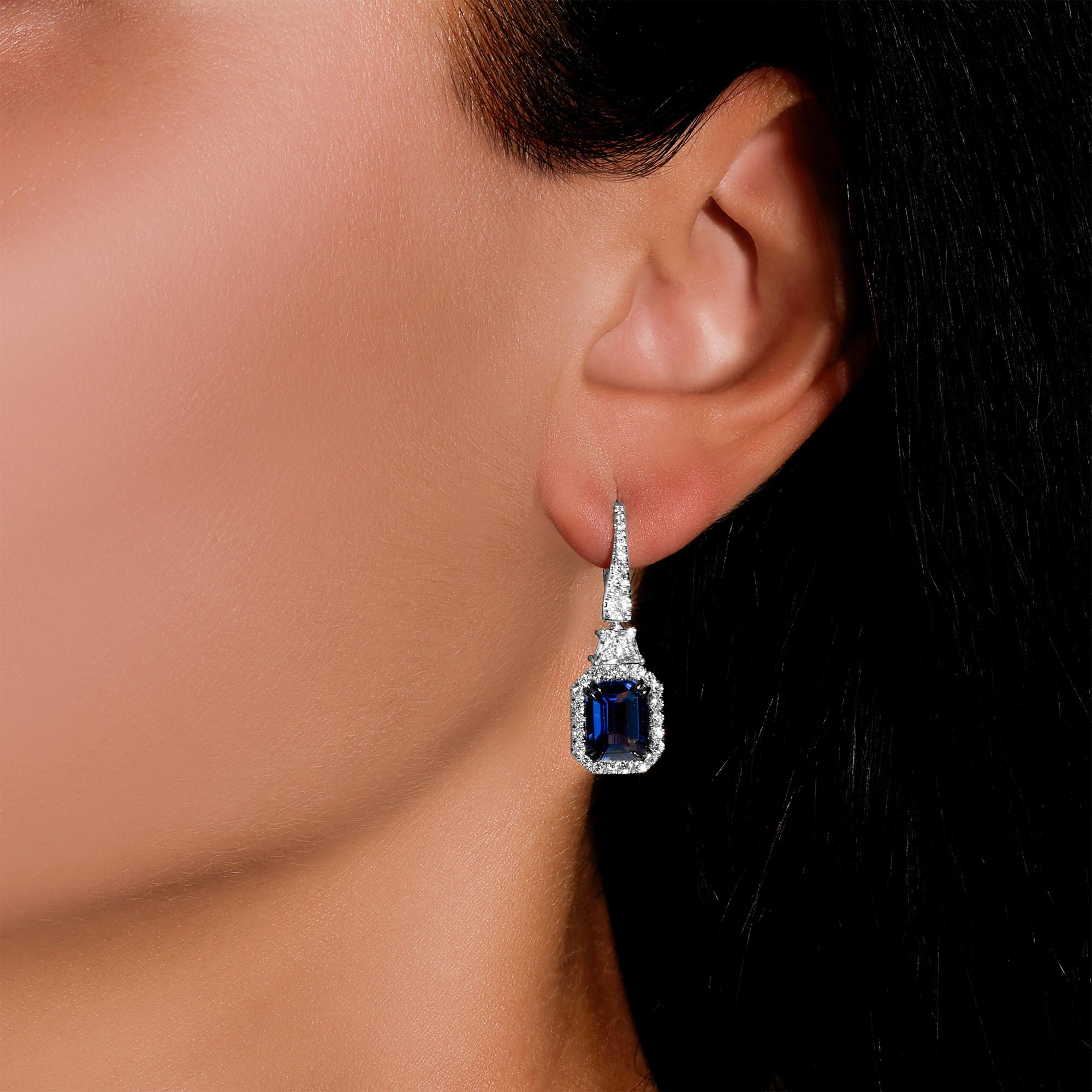 It comes with the GIA Certificate
All Gemstones are Natural
2 GIA Certified Blue Sapphires = 5.42 Carats
64 Diamonds = 1.31 Carats
Cut: Trapezoid, Round
Metal: 18K White Gold