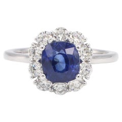 GIA Certified Blue Sapphire and Natural Diamond Halo Platinum Ring