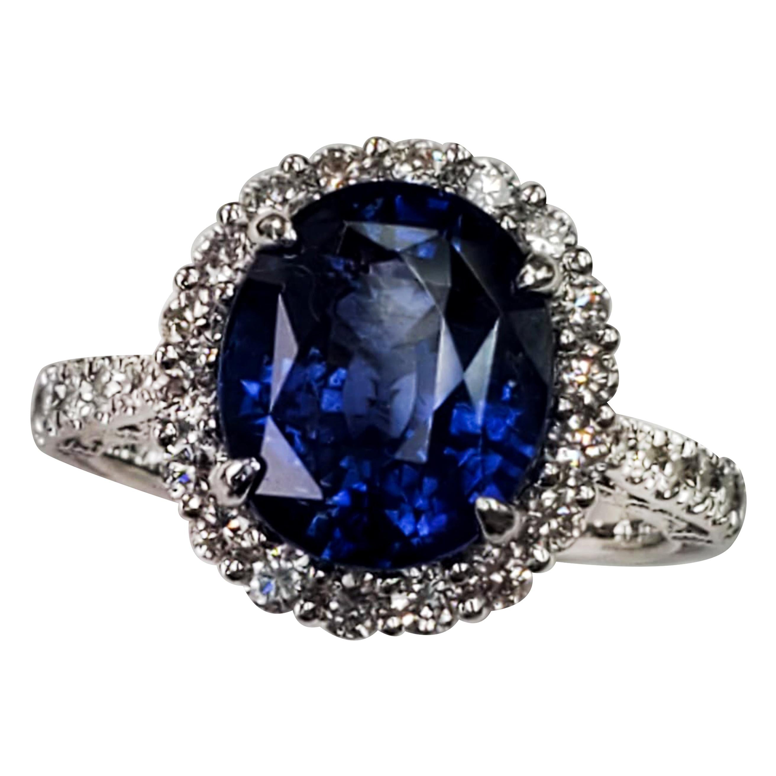 GIA Certified Blue Sapphire Oval Ring with White Diamonds