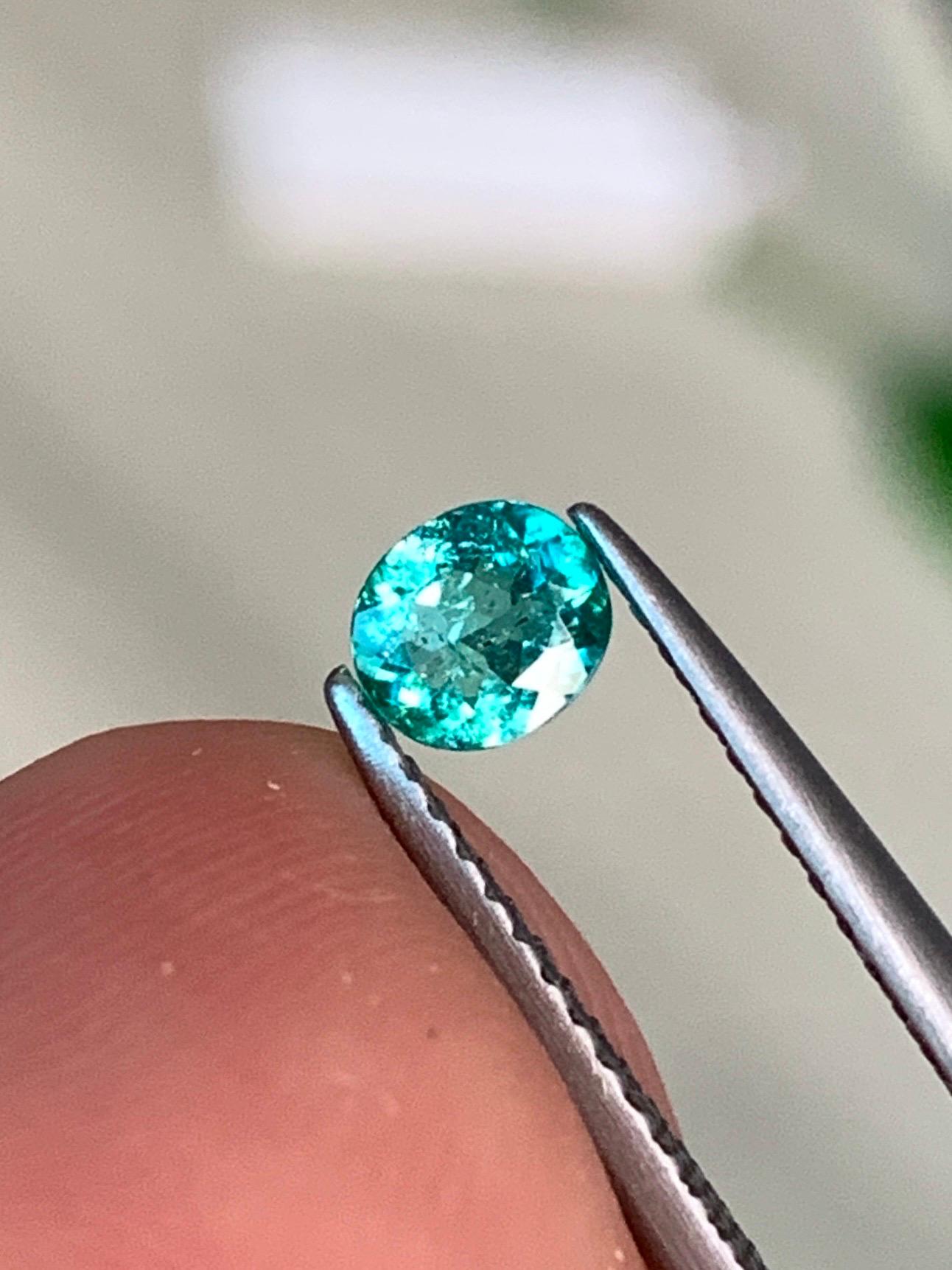 ITEM DESCRIPTION: 
Gem type : Natural Paraiba Tourmaline
Origin: Brazil
Treatment: Natural
Color: Blue-Green
shape: Oval
Size: 0.38 Carats


Paraíba tourmaline is one of the most coveted and valuable gemstones in the world, distinguished by its