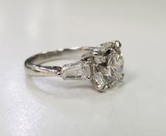 GIA Certified Brilliant Cut 4.07 Carat  H VS1 Platinum with 2 Baguettes 1.09