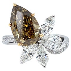Used GIA Certified Brown-Yellow Pear Cut 3.12 Carat Diamond Ring in 18K Gold