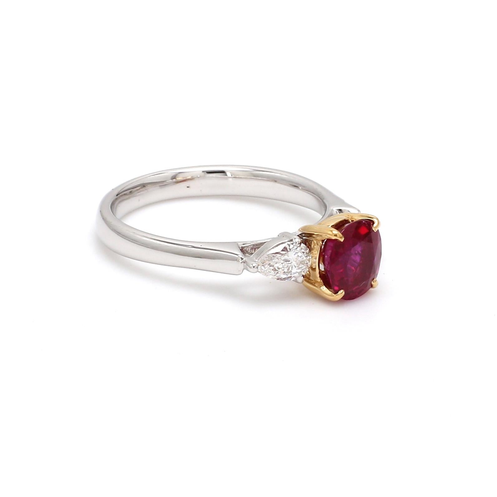 A Beautiful Handcrafted Ring in 18 Karat White Gold  with Natural No Heat Certified Ruby of Burma ( Myanmar) origin and Brilliant Cut D Color Pear Diamonds on side.

its a Generational Collection Piece

Ruby Details
Weight: 1.25 carats
Exceptional