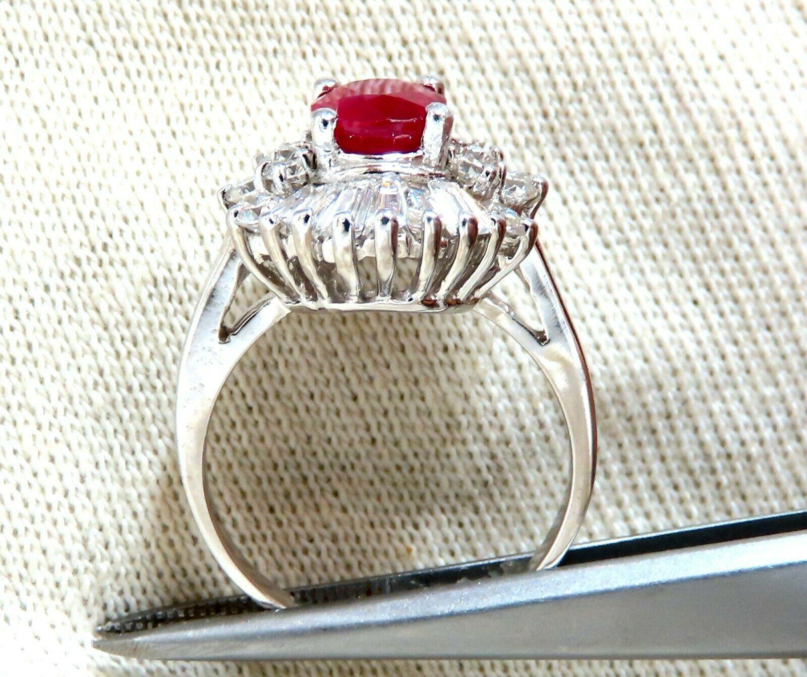 GIA Certified Ruby Diamonds Ballerina Cocktail Ring.

1.75ct. GIA Oval Bright Red Ruby

Report: 5192200392

(VS) Clean Clarity & Transparent.

7.89 X 6.26 X 4.07mm

GIA: Heat, Burma



1.70ct side round & baguette diamonds.

(1.00ct Baguettes &