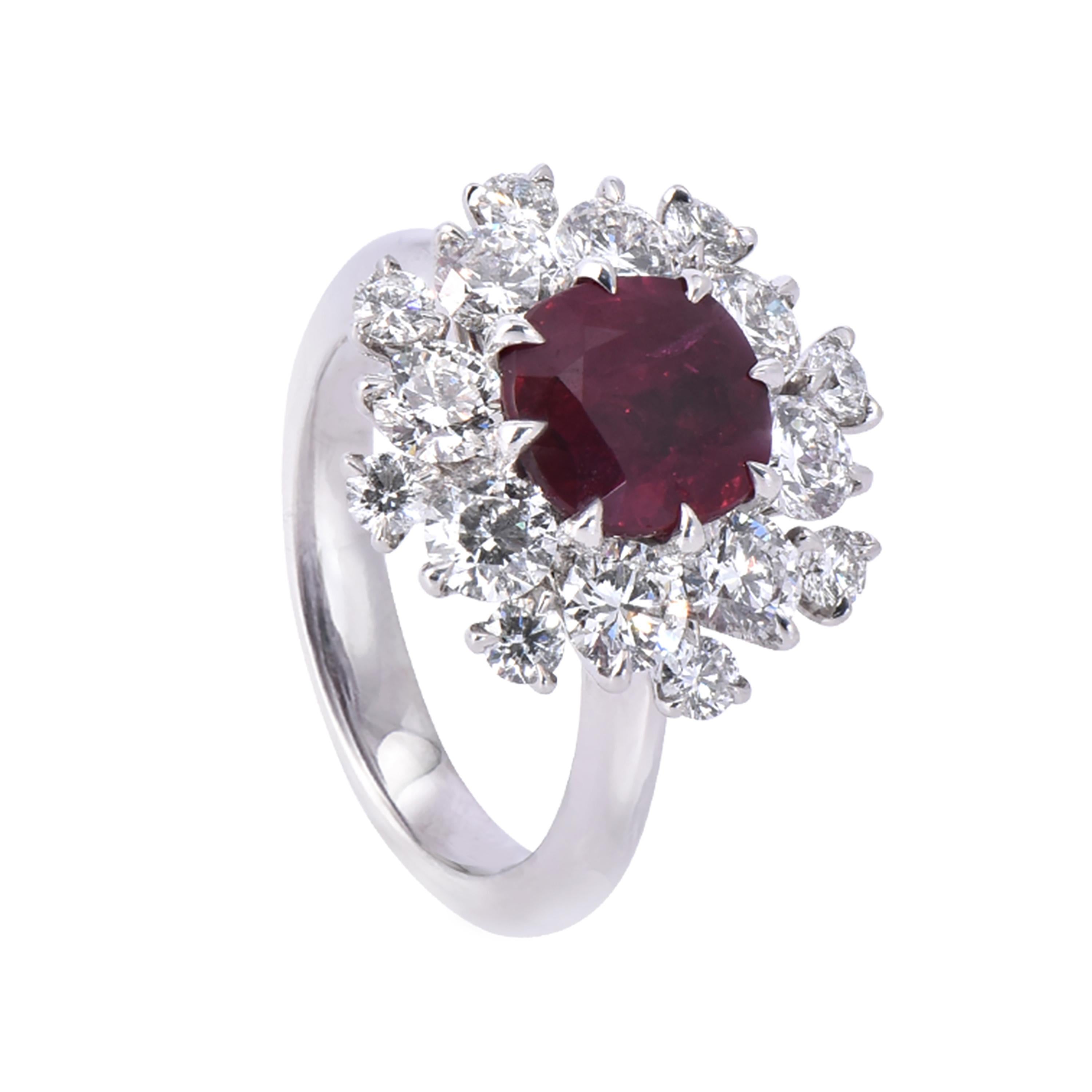 A classic 18 karat white gold ruby ring from the Carmine collection of Laviere. The ring is set with a 3.21 carats GIA certified Burmese vivid red cushion-cut ruby and 2.45 carats round brilliant diamonds. 
Gold Weight 9.69 grams. Diamond Clarity