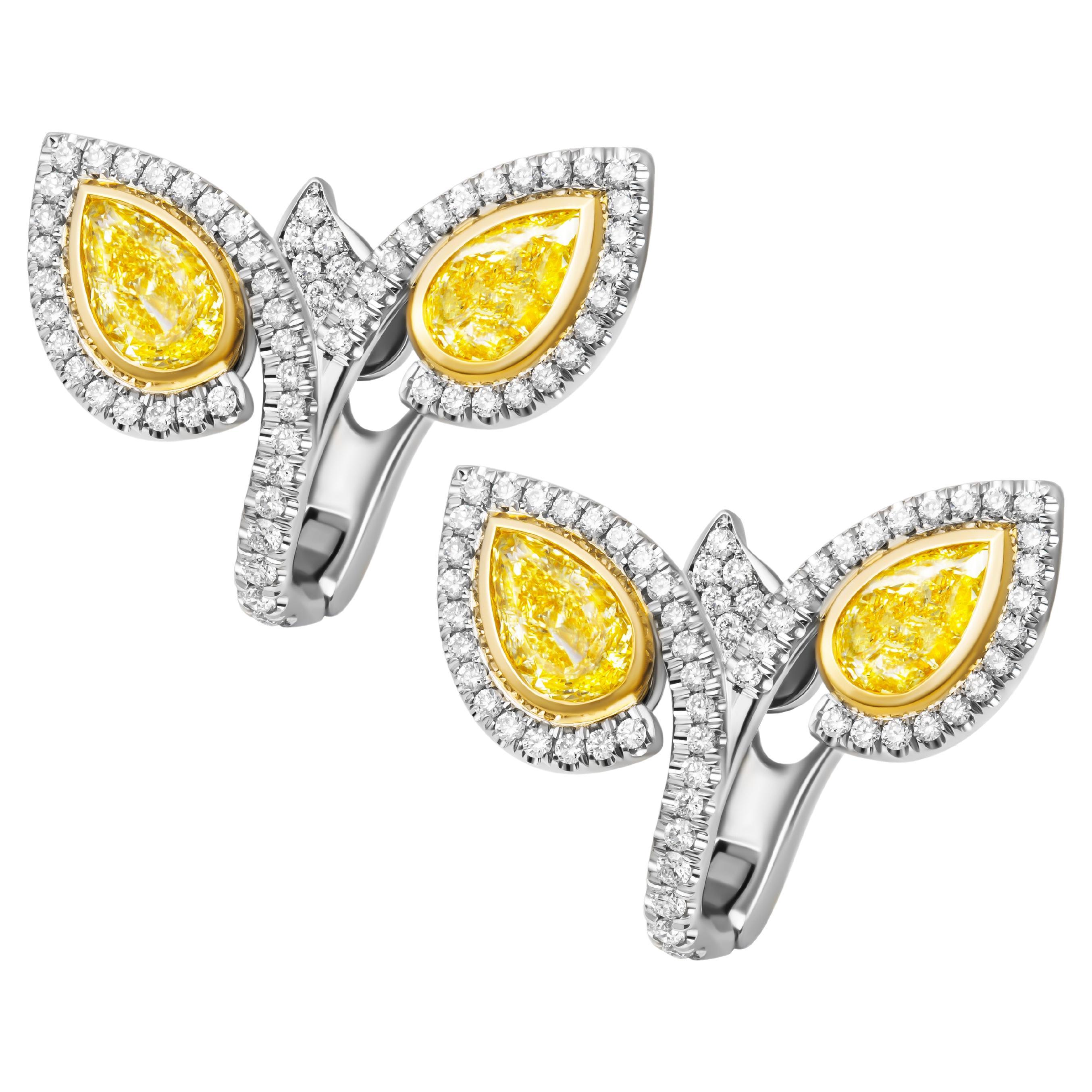 GIA Certified ByPass Earring with Fancy Yellow Pear Shape Diamonds im Angebot