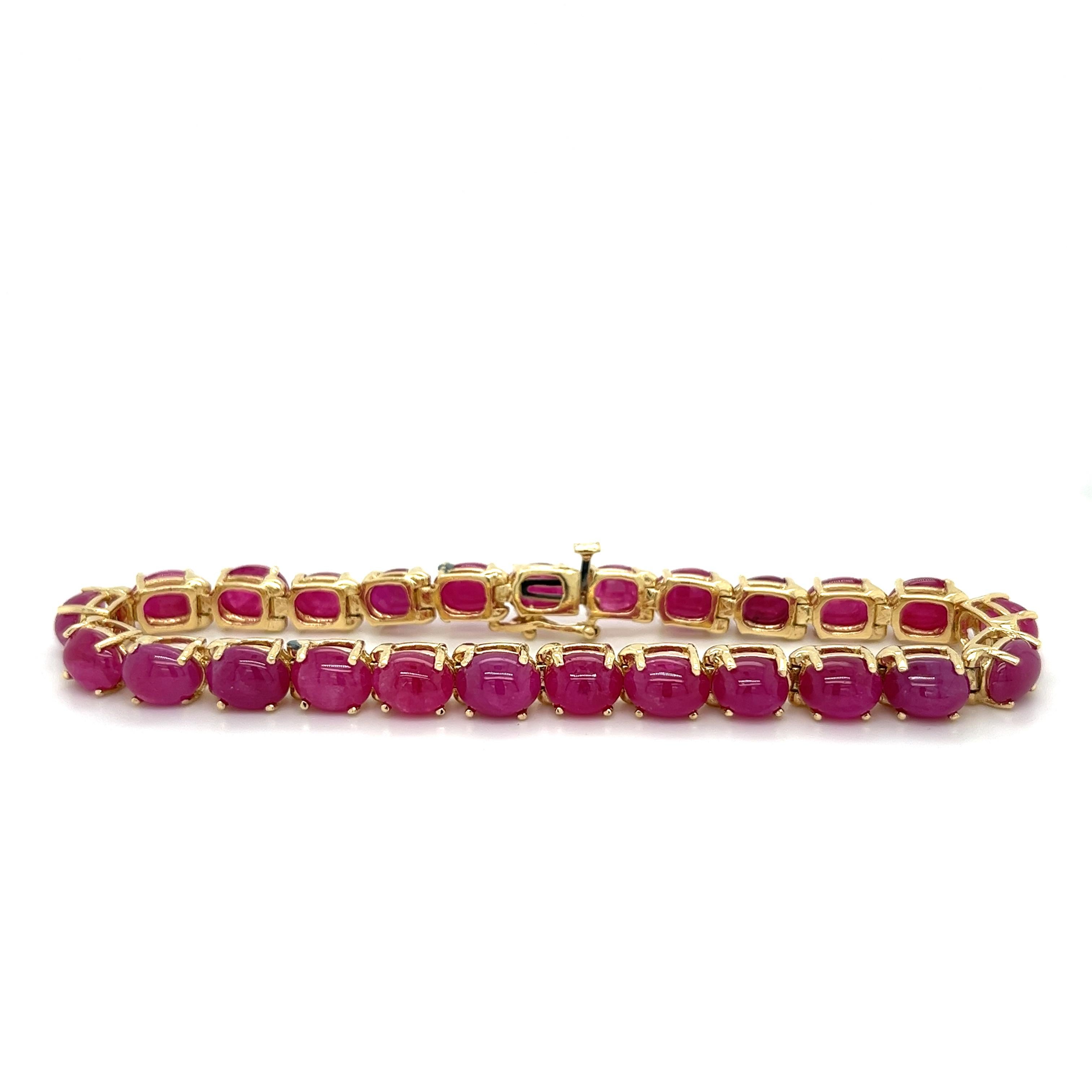 GIA certified natural Ruby bracelet in 14-karat solid yellow gold. The ideal length and width for both men and women. Featuring a box closure with single latch safety. 24 total Rubies, weighing a combined approximate weight of 40 carats. Oval