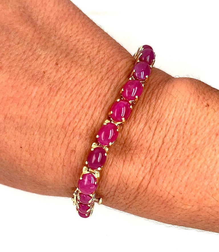 GIA Certified Cabochon Cut Oval Ruby Ball Unisex Bracelet in 14K Gold For Sale at 1stDibs