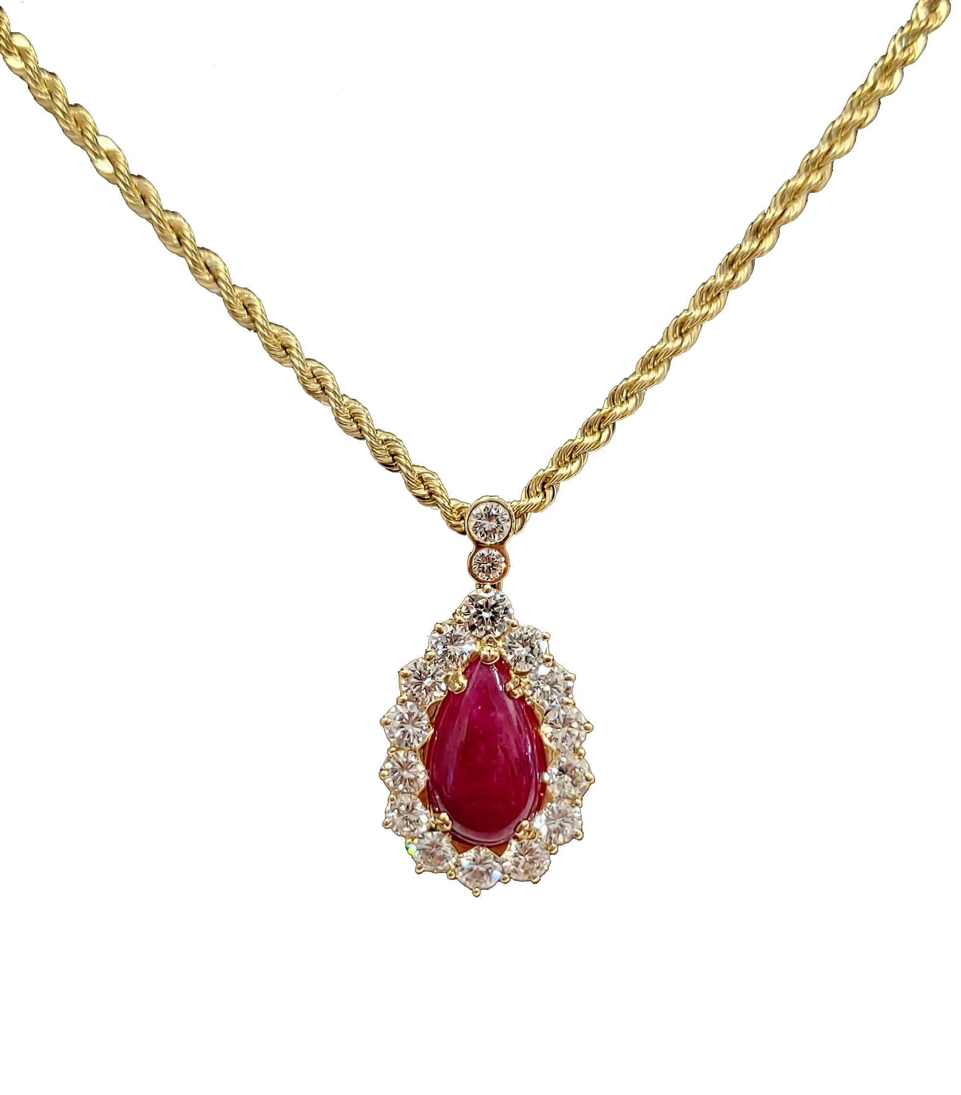 GIA certified, no heat cabochon ruby and diamond pendant and earring set. The rubies in the pendant and earrings are all GIA certified and show no indication of heating. The pendant and earrings are made with 18 karat yellow gold, the chain in 14