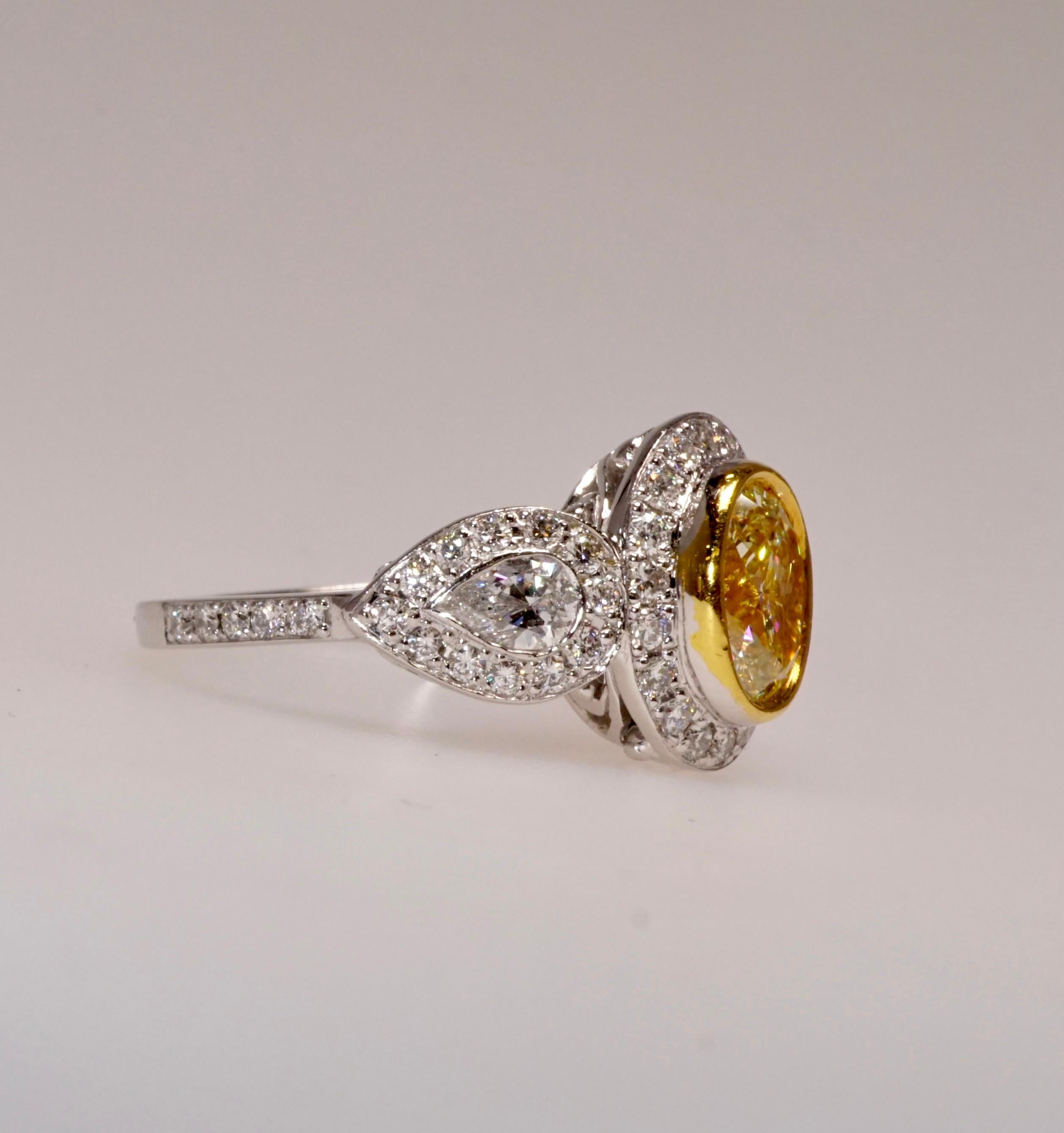 1.01 Carat Fancy Yellow Oval Cut Diamond Engagement Ring In New Condition In New York, NY