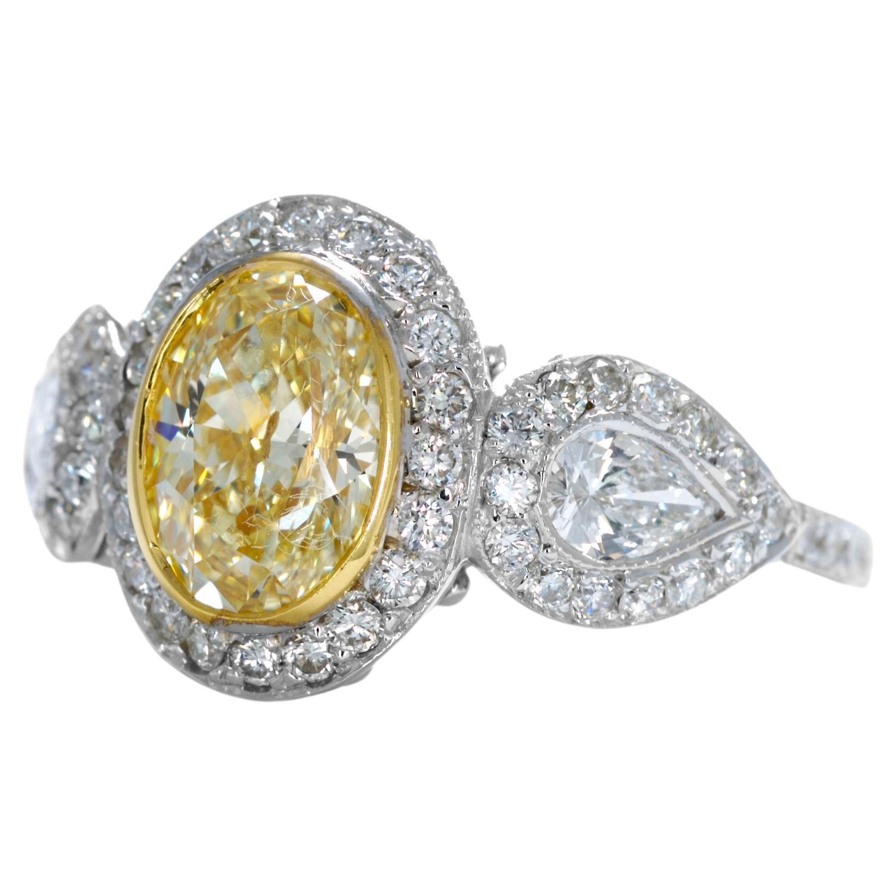 1.01 Carat Fancy Yellow Oval Cut Diamond Engagement Ring