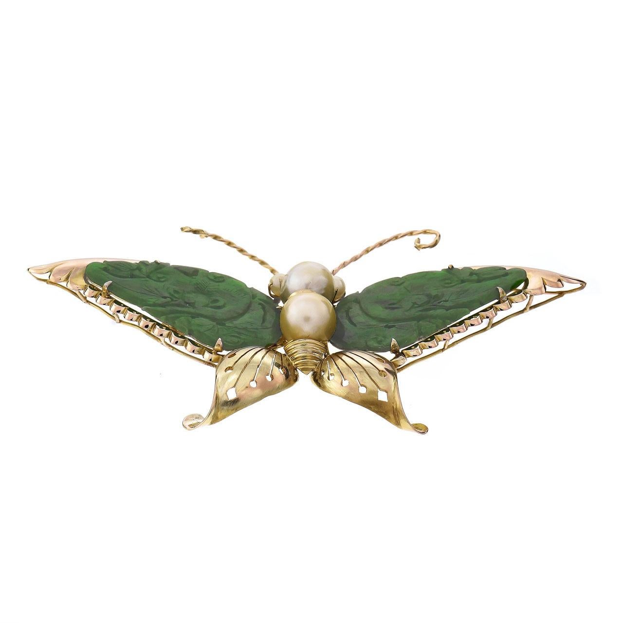 Vintage 1940's handmade Jade and Pearl Butterfly brooch. 14k yellow and rose gold with cultured Pearl accents and hand carved bright green Omphacite Jade wings. GIA certified. 

2 pierced carved Omphacite Jade, 34.13 x 20.26mm, GIA certificate