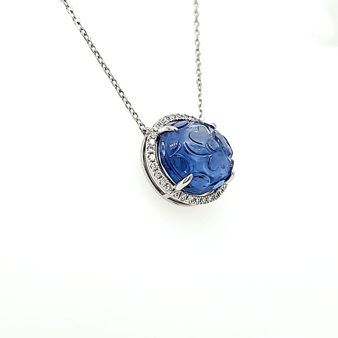 Contemporary GIA Certified Carved, Unheated Sri Lankan Sapphire Pendant For Sale