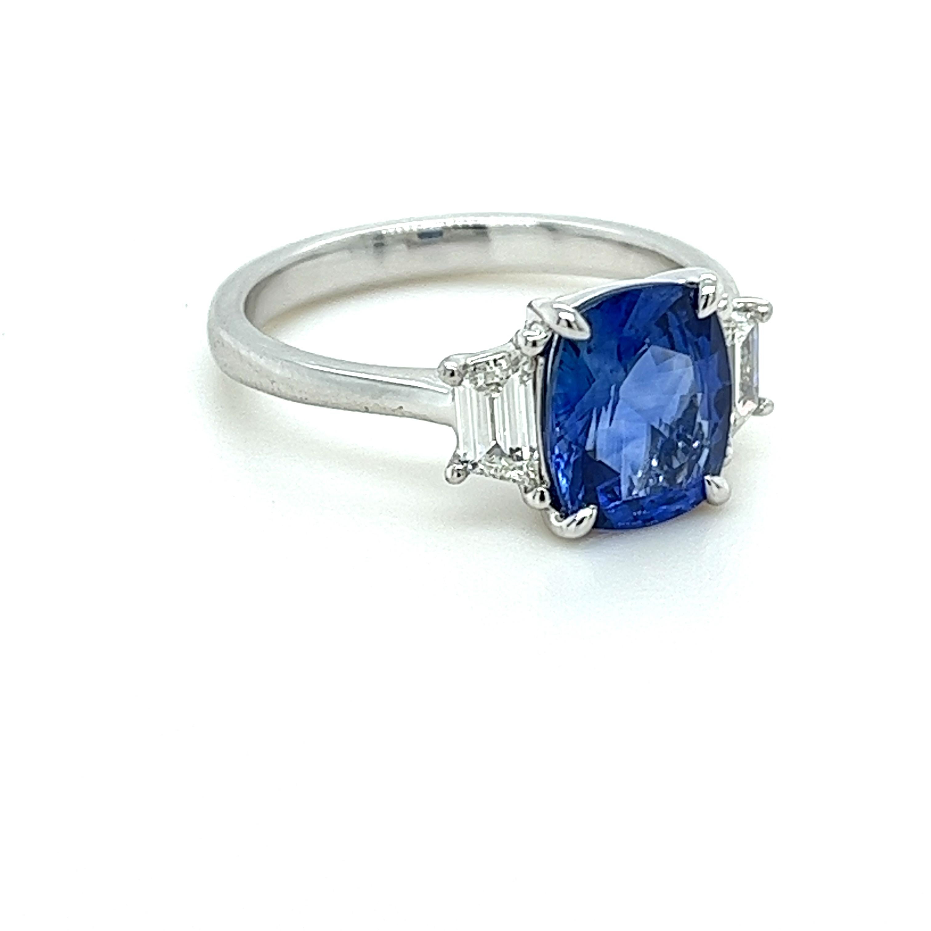 Modern GIA Certified Ceylon Blue Sapphire & Diamond Three Stone Ring in Platinum For Sale