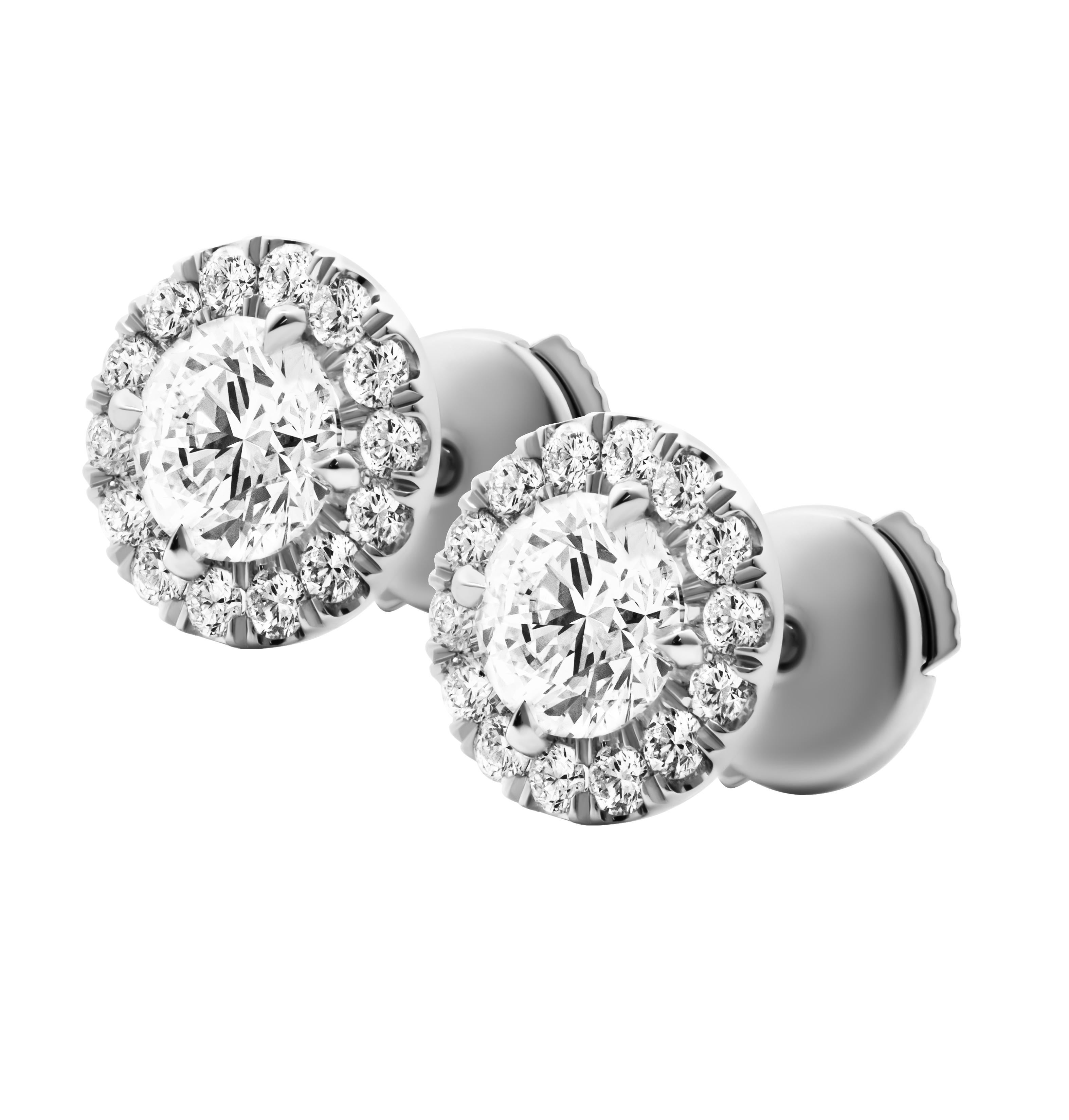 Modern GIA Certified Classic halo studs in Platinum For Sale